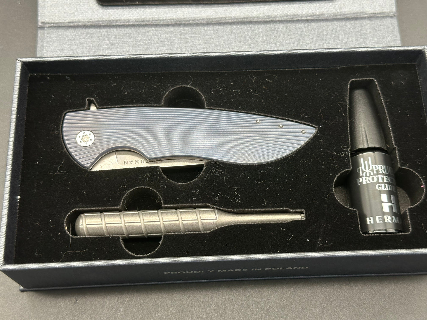 Herman Sting Blue titanium handle w/RWL34 blade