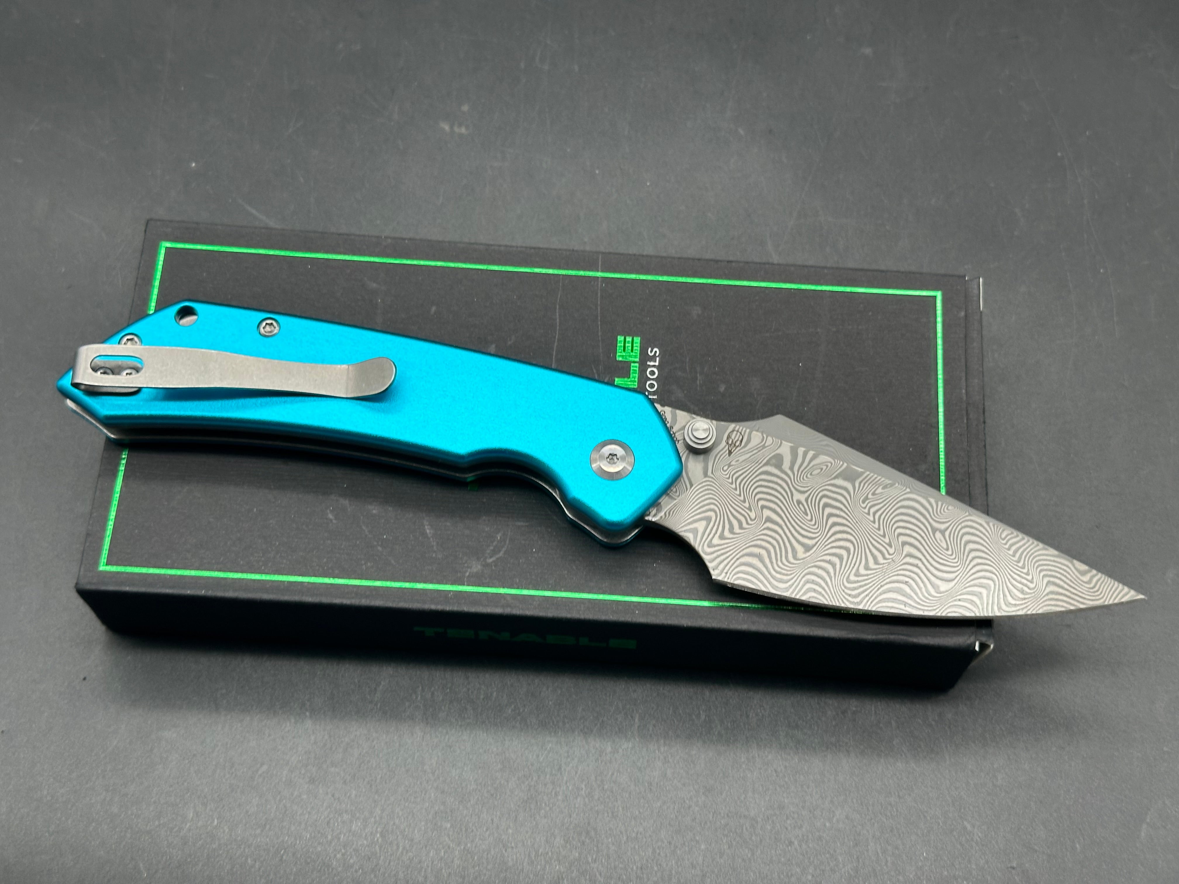 TENABLE FENRIR TOP LINER LOCK BLUE ALUMINUM HANDLE DAMASCUS BLADE