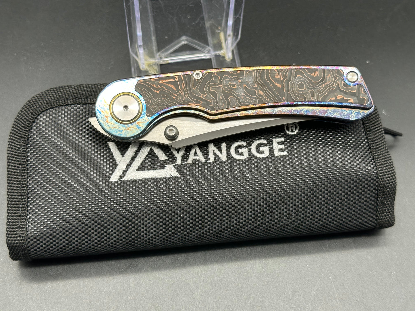 YANGGE FOLDING KNIFE COLOR TITANIUM COPPER FOIL CARBON FIBER HANDLE S90V BLADE