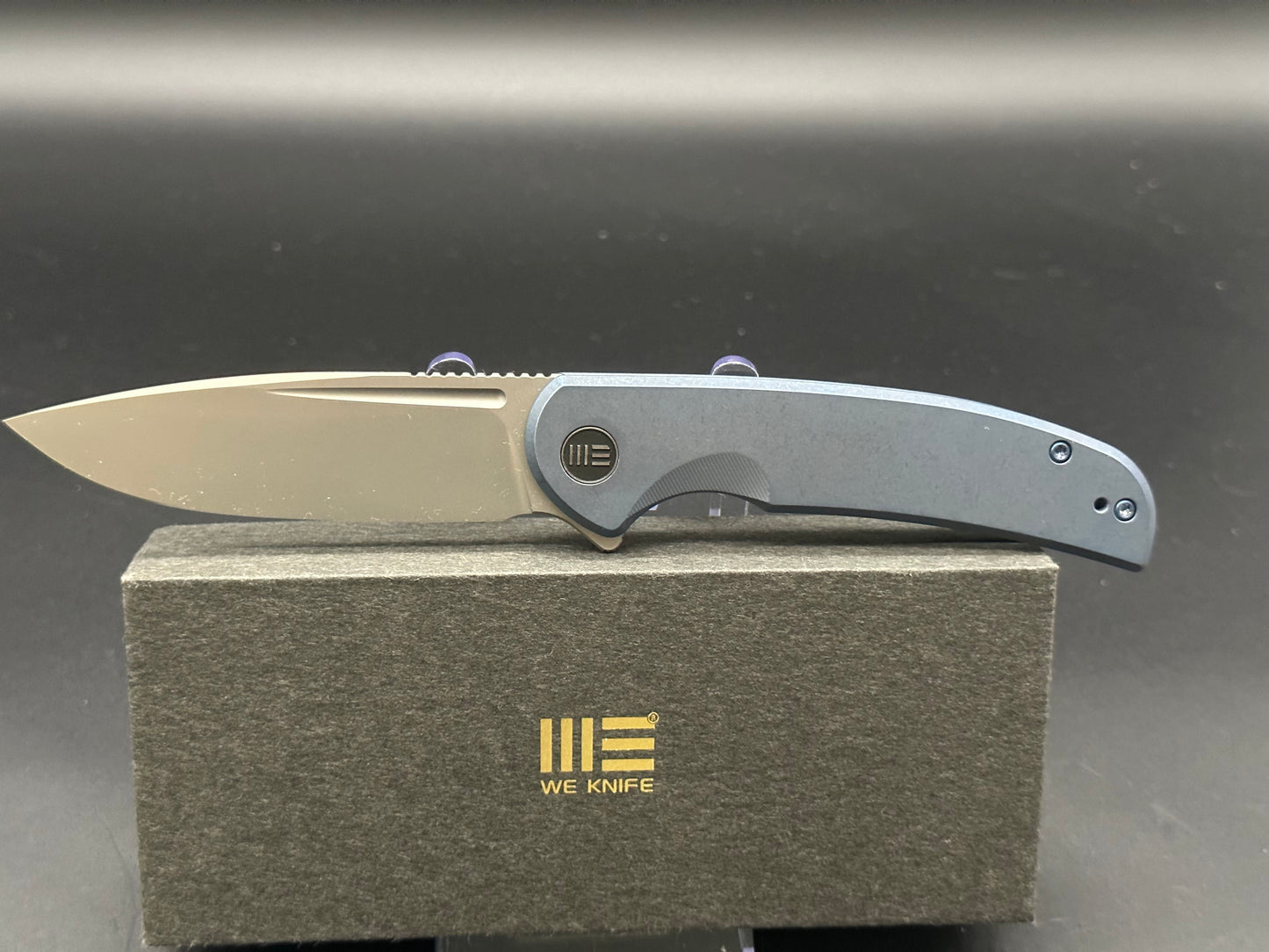 WE Beacon blue titanium handle w/20CV blade