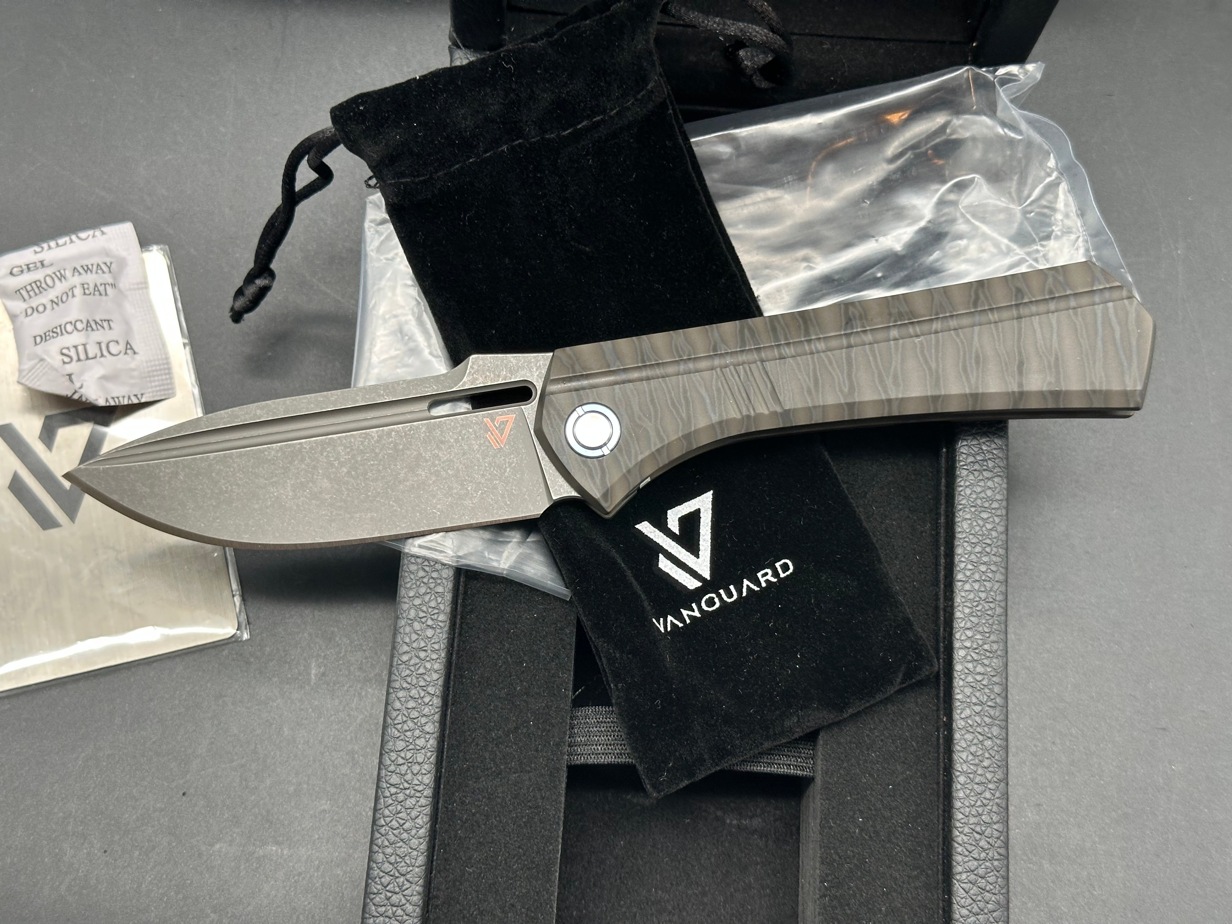 Vanguard Continuum, Dark Stonewashed M390 Blade, Flame Anodized Titanium Handles, Dark Blasted Titanium Backspacer and Pocket Clip