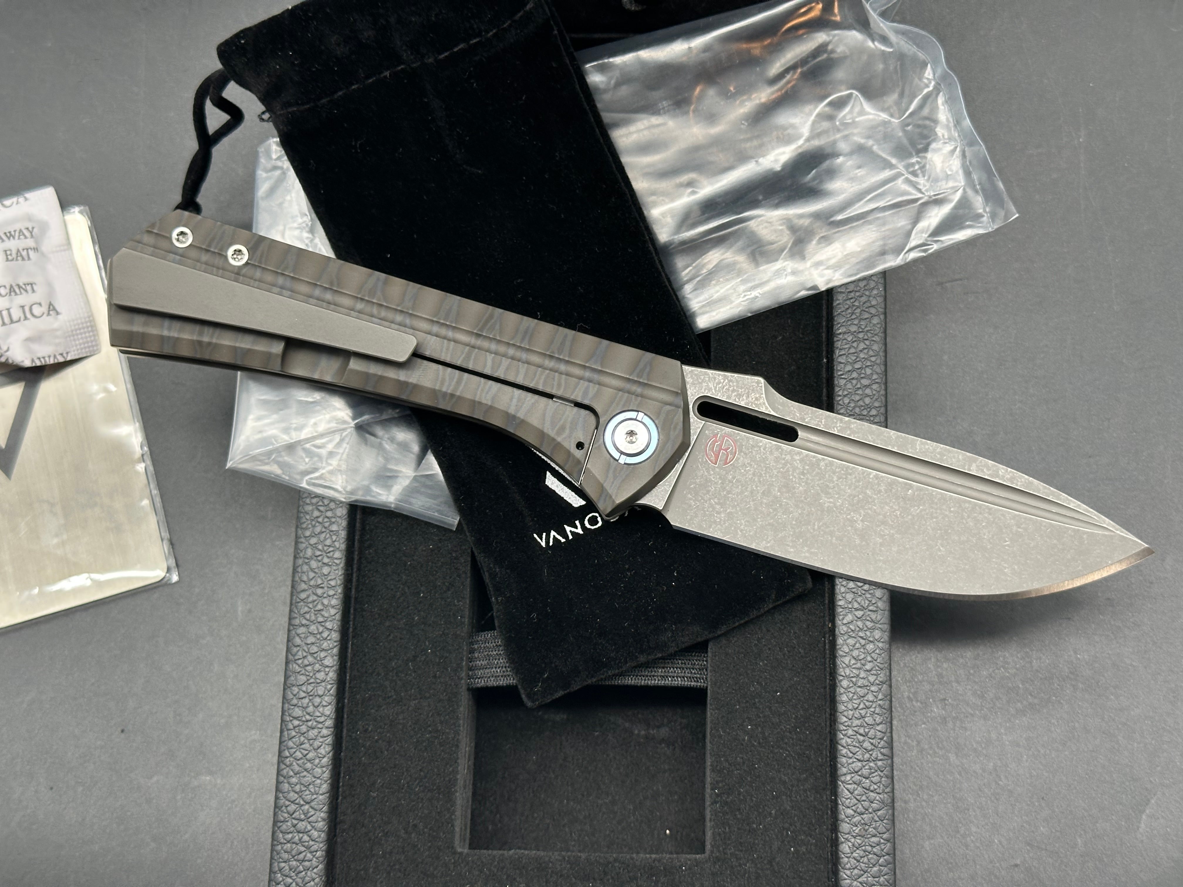 Vanguard Continuum, Dark Stonewashed M390 Blade, Flame Anodized Titanium Handles, Dark Blasted Titanium Backspacer and Pocket Clip
