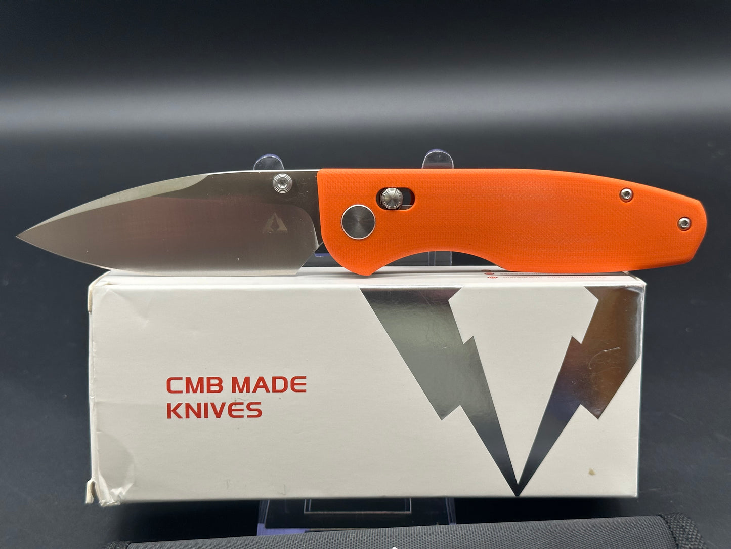 CMB Predator Orange G10 w/D2 blade