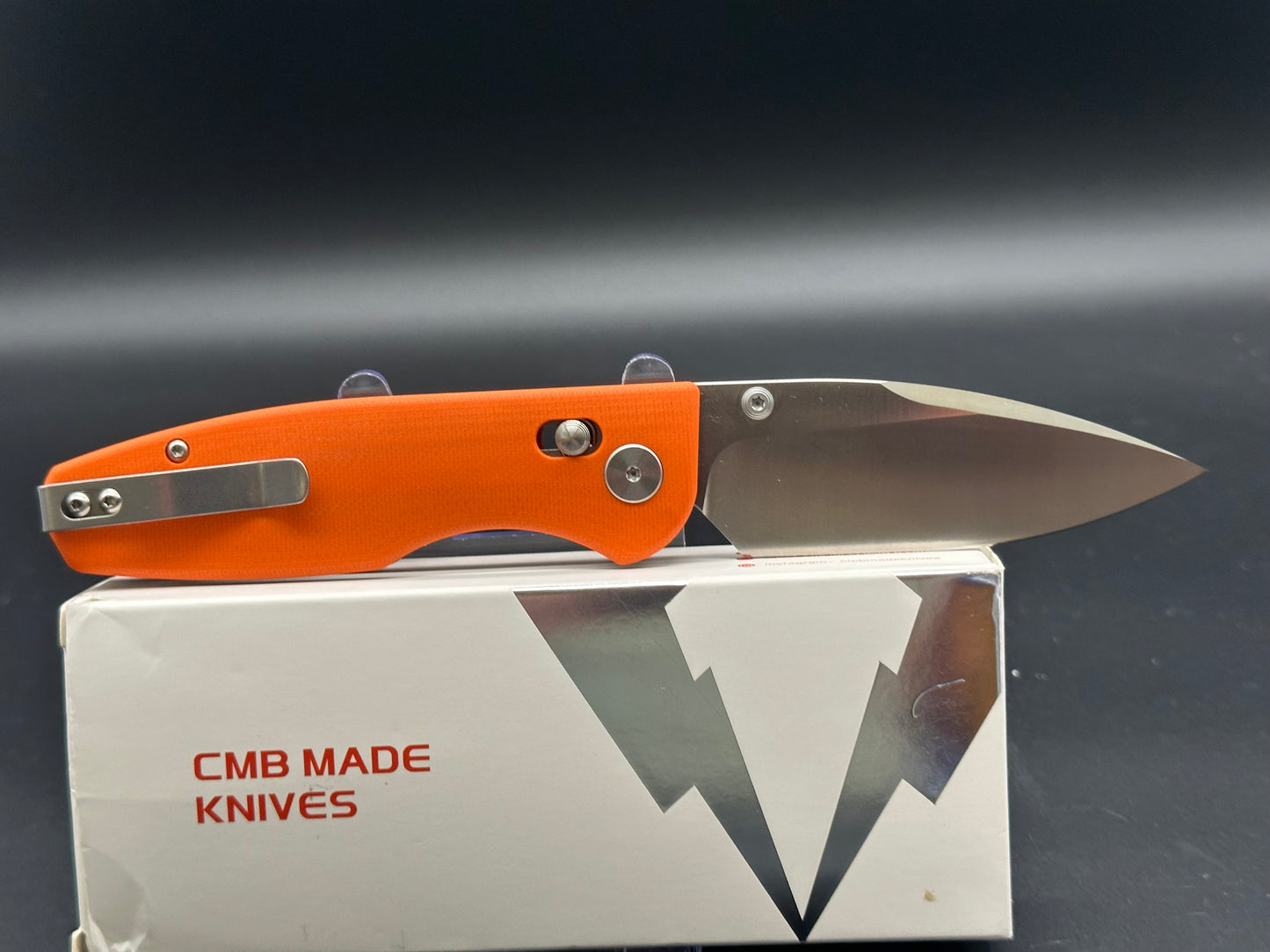 CMB Predator Orange G10 w/D2 blade