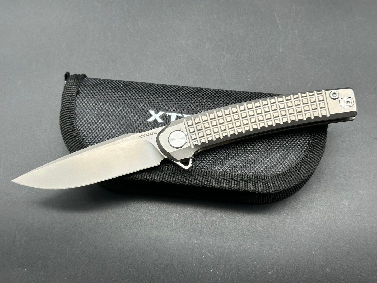 XTOUC RX302 titanium handle w/M390 blade