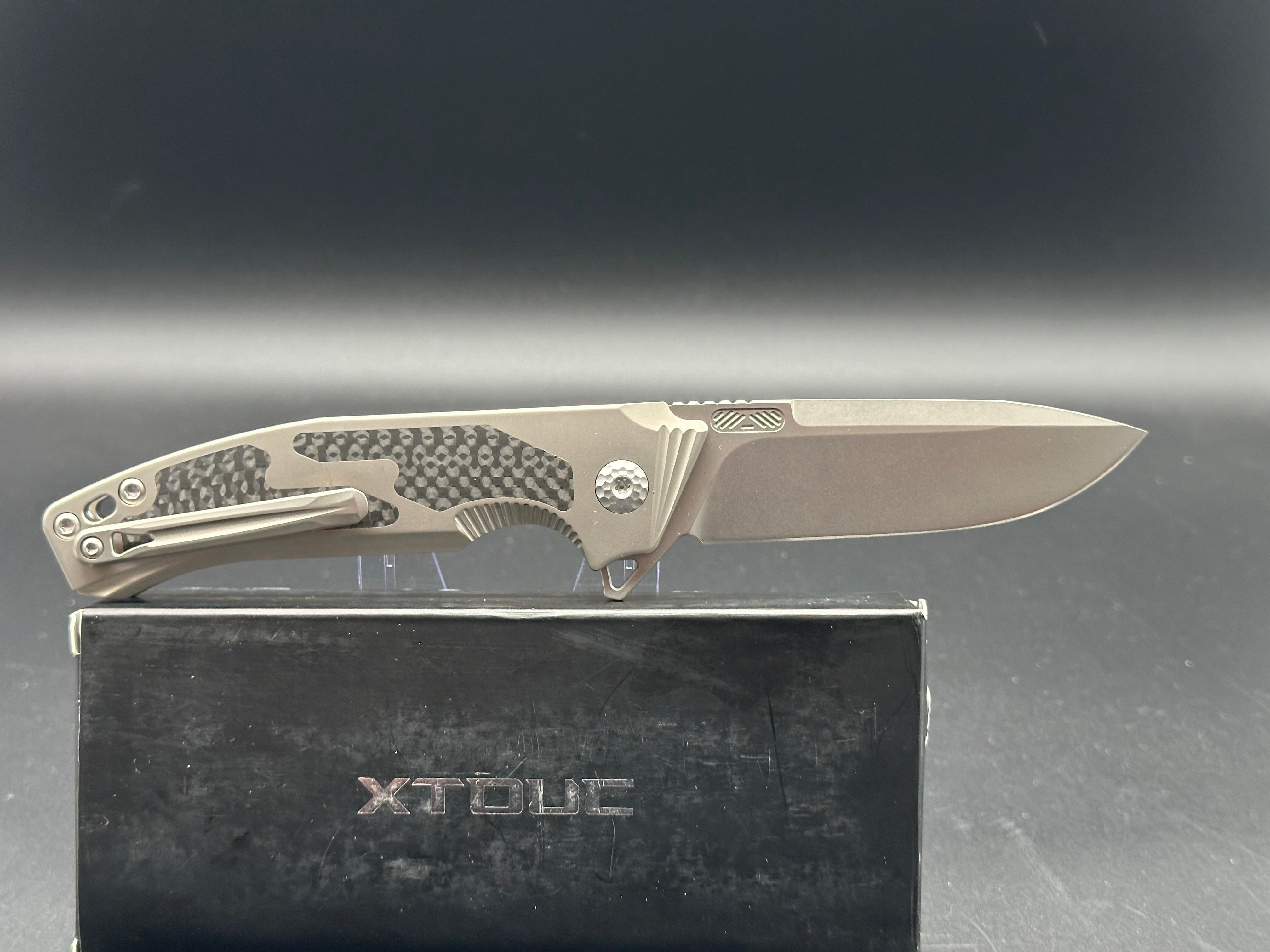 Remette Steed titanium/CF handle w/M390 blade