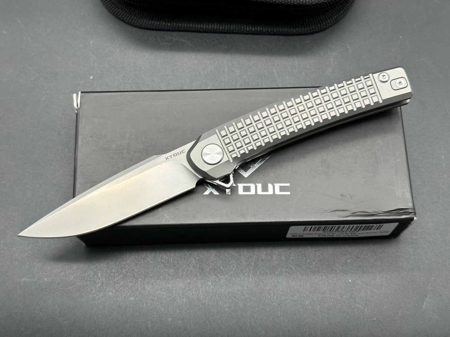 XTOUC RX302, 3.15" M390 Bead Basted Blade with Titanium Frag Handle