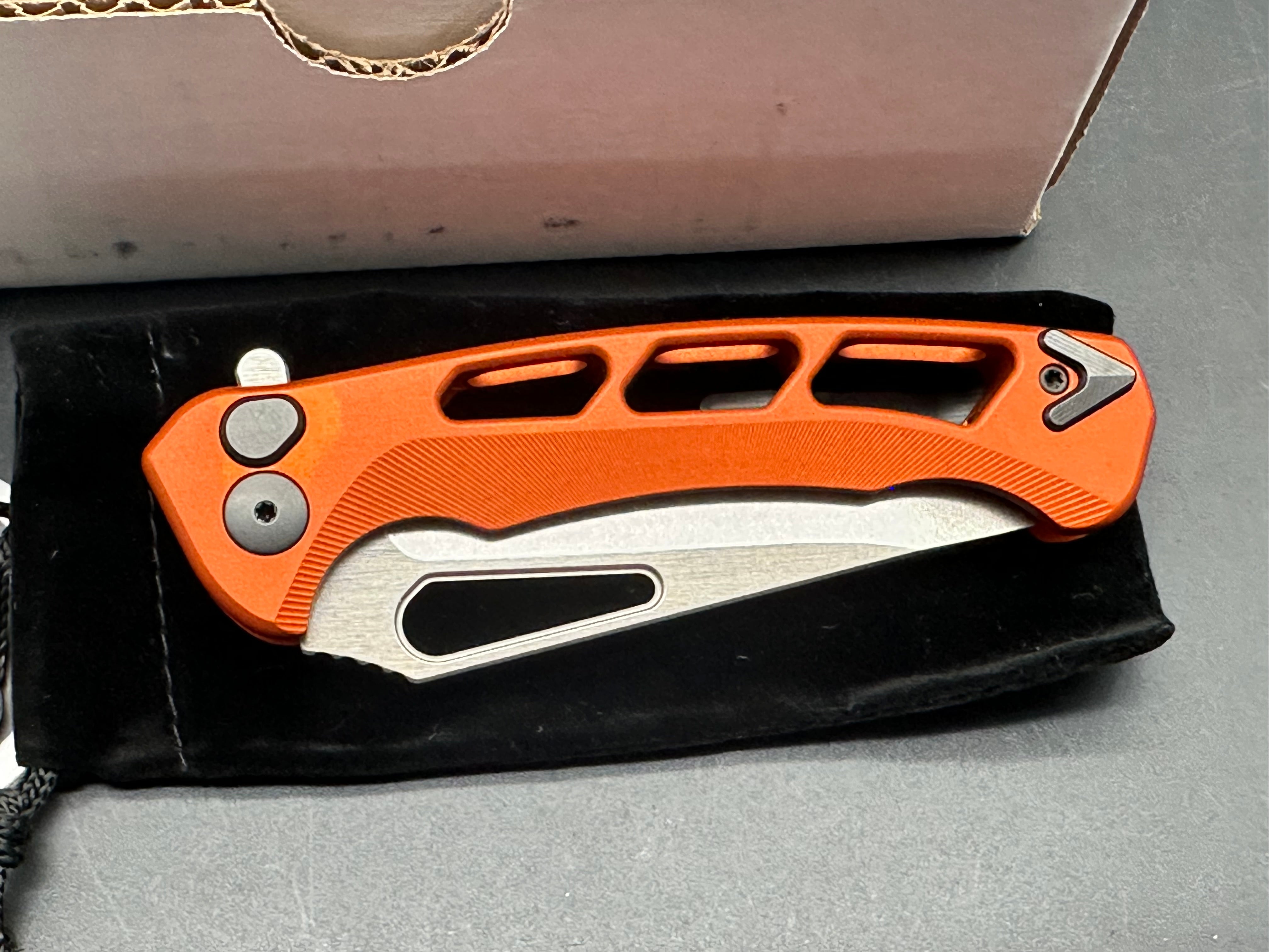 Dead Reckon Knives Ridgeback Integral Vertebrae, 3.42" CPM MagnaCut Stonewash Modified Clip Point Blade with Orange Integral Vertebrae Aluminum Scale