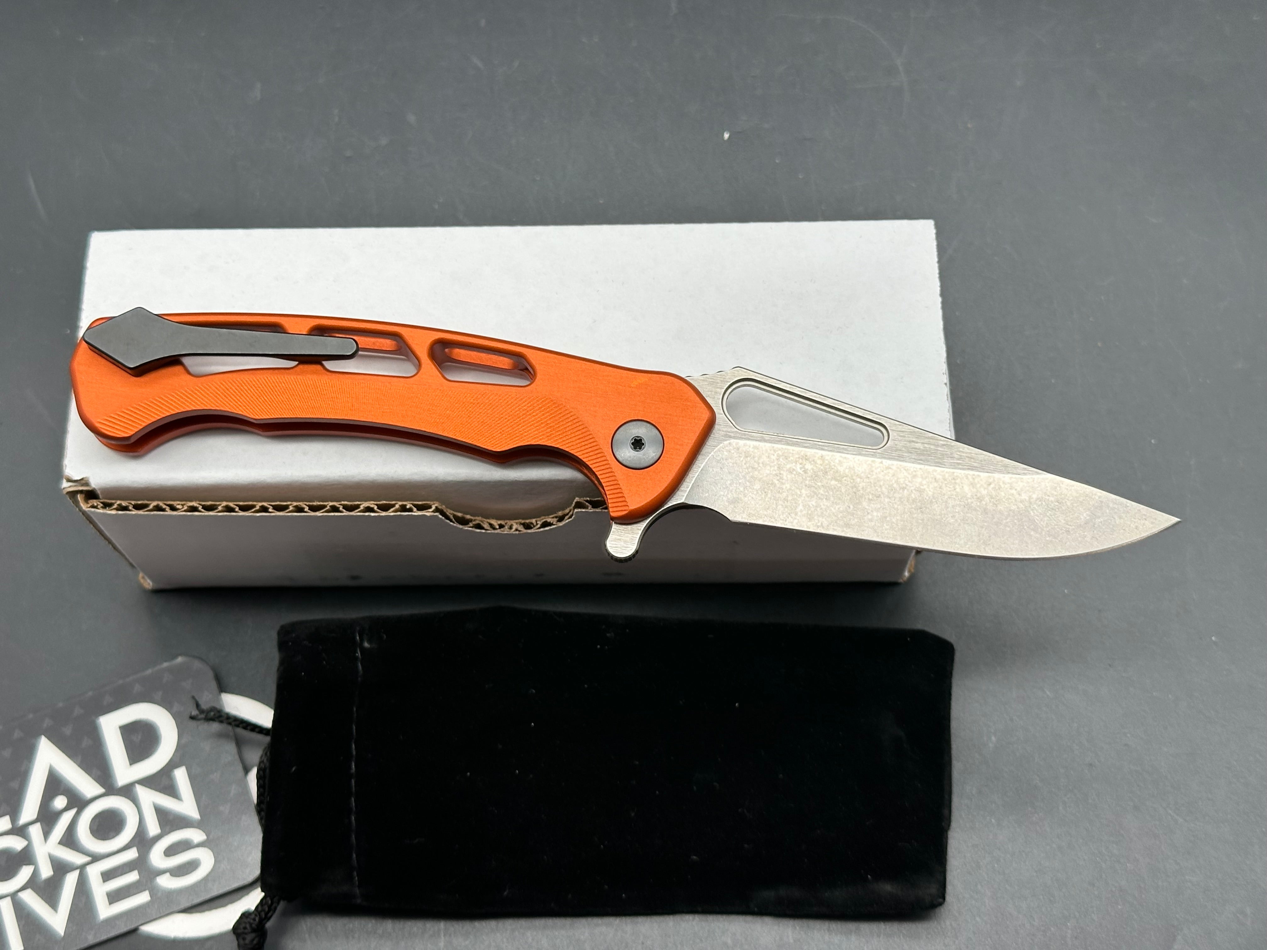 Dead Reckon Knives Ridgeback Integral Vertebrae, 3.42" CPM MagnaCut Stonewash Modified Clip Point Blade with Orange Integral Vertebrae Aluminum Scale
