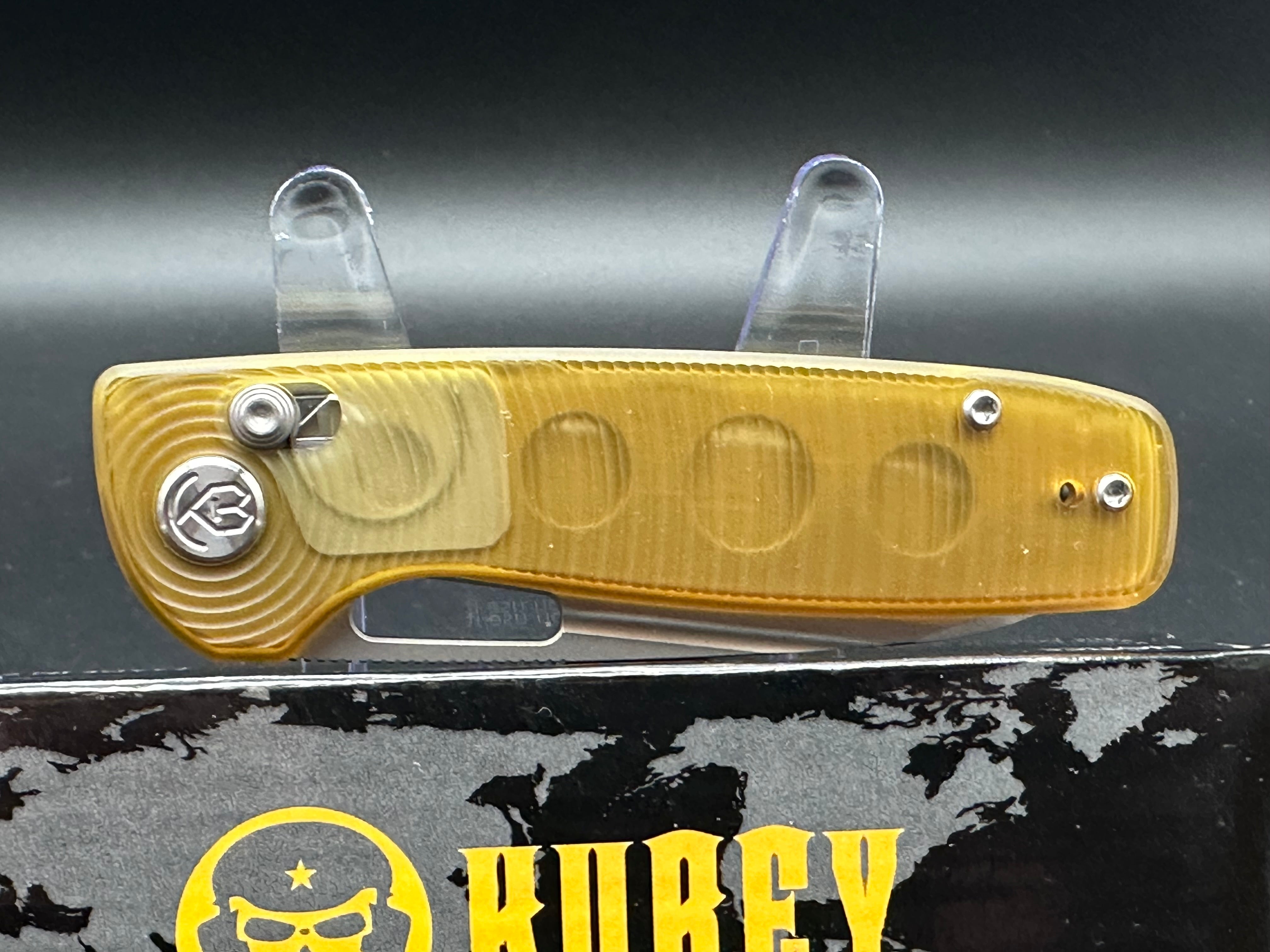 KUBEY BLUFF FOLDING KNIFE AMBER ULTEM HANDLE 14C28N PLAIN EDGE SANDBLAST FINISH KU248A