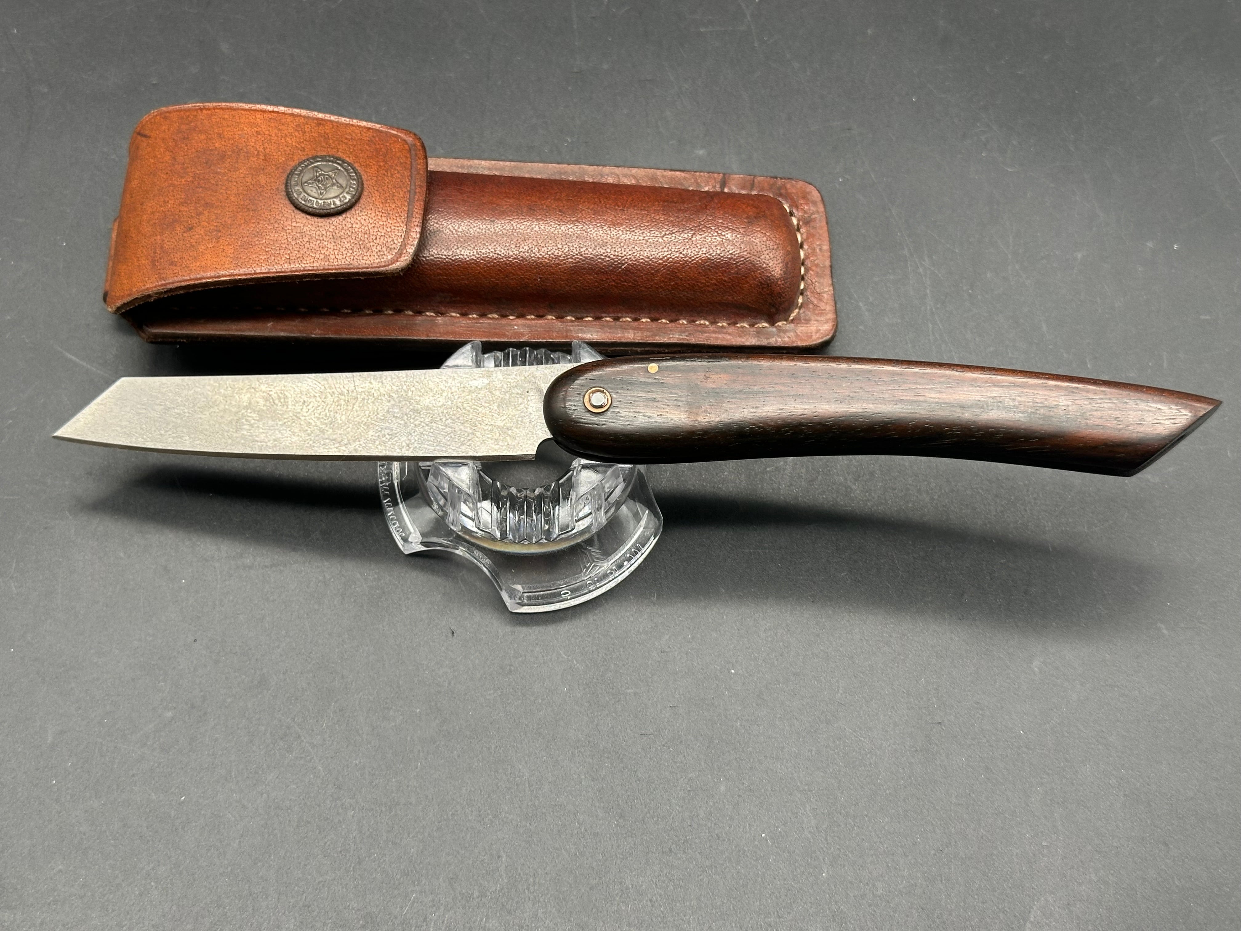 Younique Design “Friction Folder”  Rosewood handle w/Wootz crucible steel blade