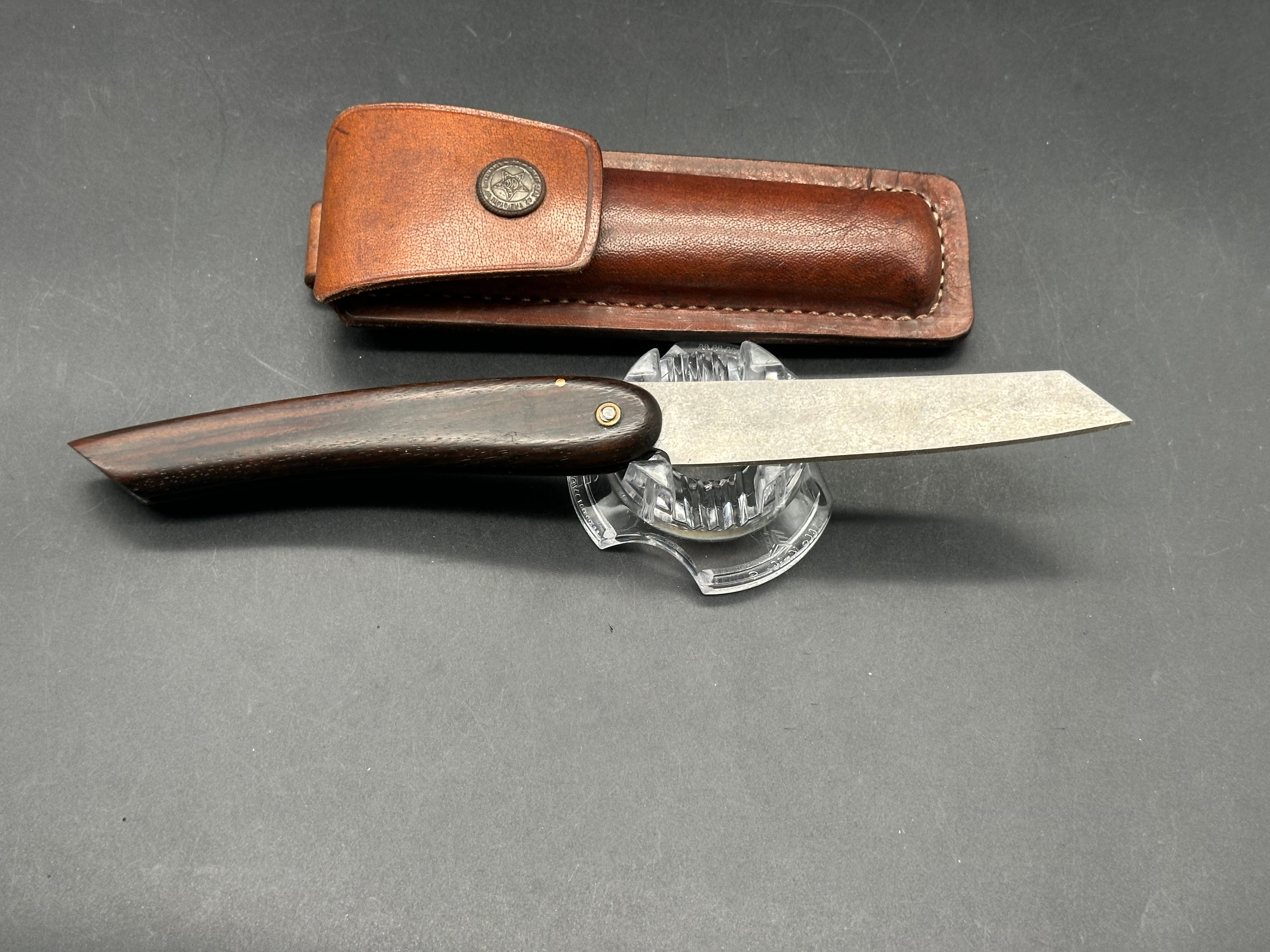 Younique Design “Friction Folder”  Rosewood handle w/Wootz crucible steel blade