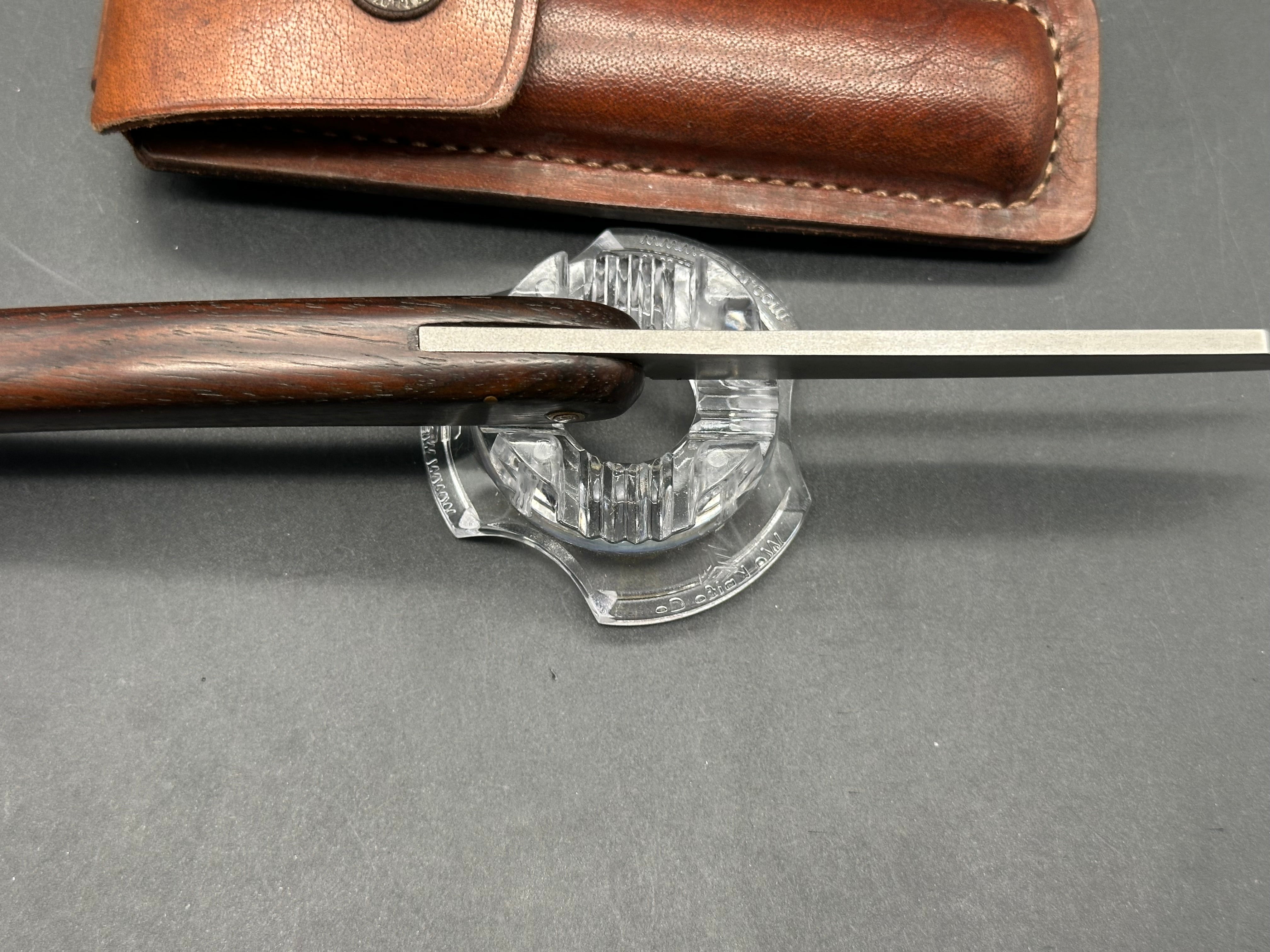 Younique Design “Friction Folder”  Rosewood handle w/Wootz crucible steel blade