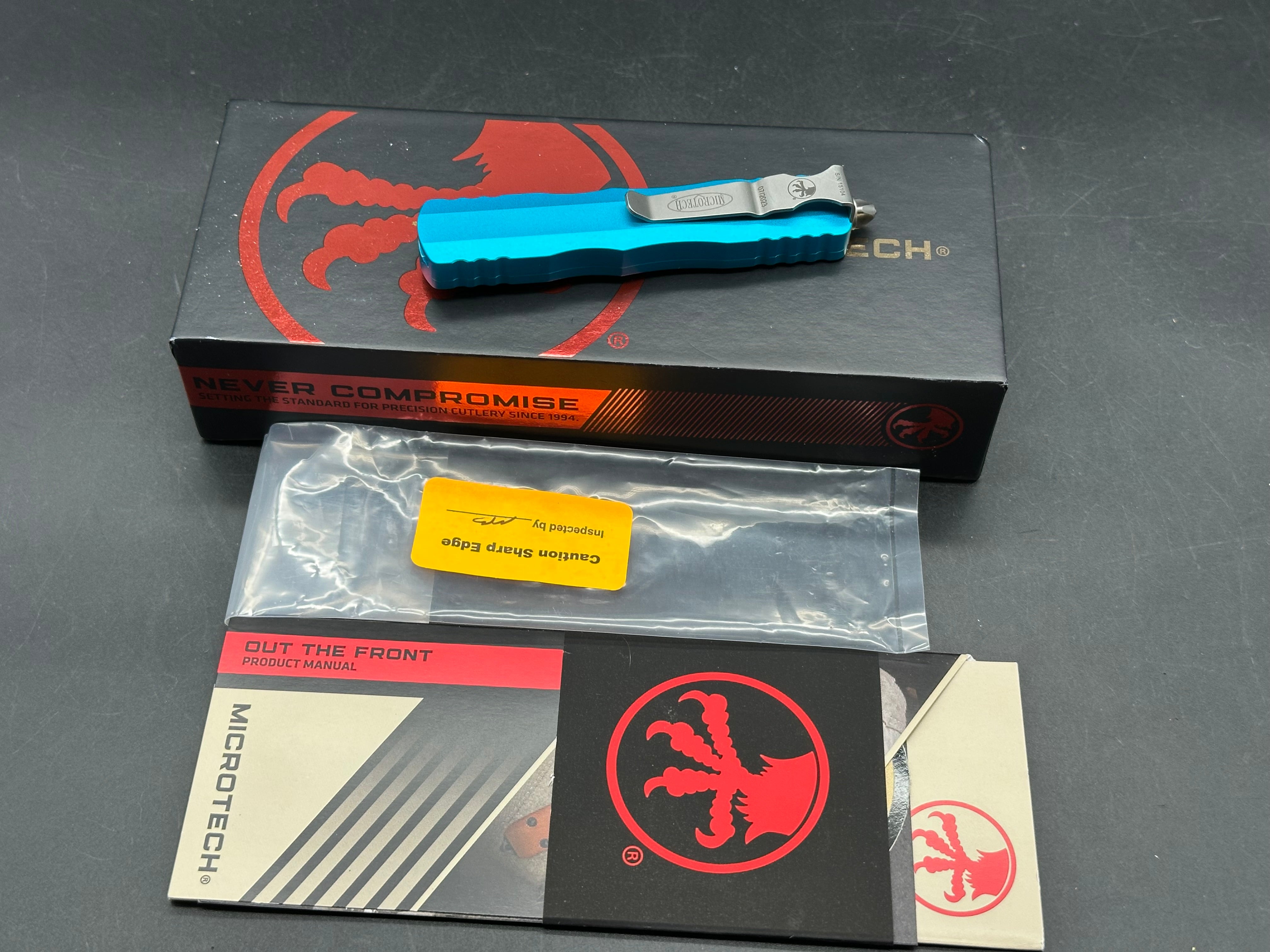 Microtech 225-11TQ Dirac AUTO OTF Knife 2.92" Stonewashed Double Combo Edge Dagger Blade, Turquoise Aluminum Handles