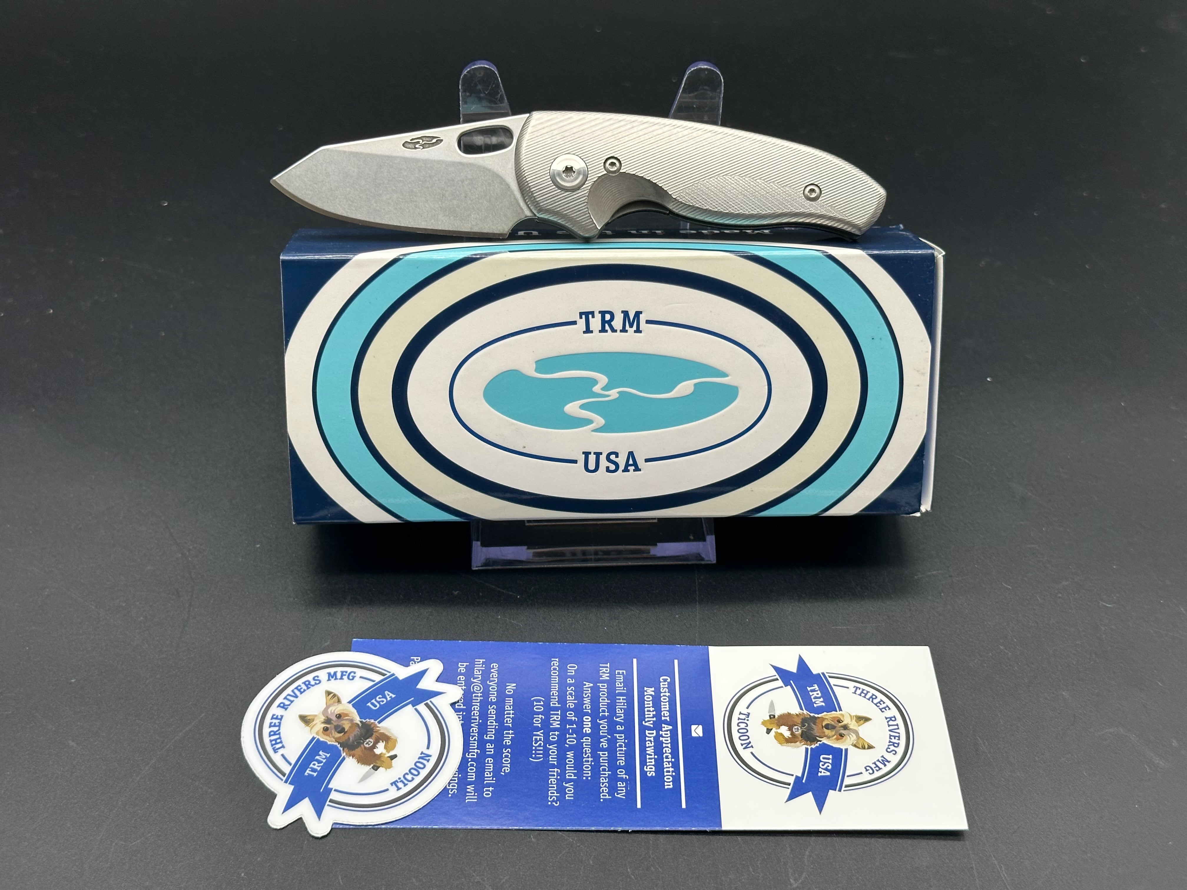 TRM Hole-Y Nerd Titanium handle w/20CV blade