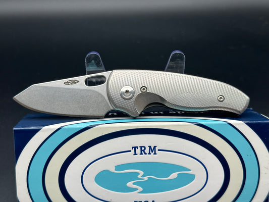 TRM Hole-Y Nerd Titanium handle w/20CV blade