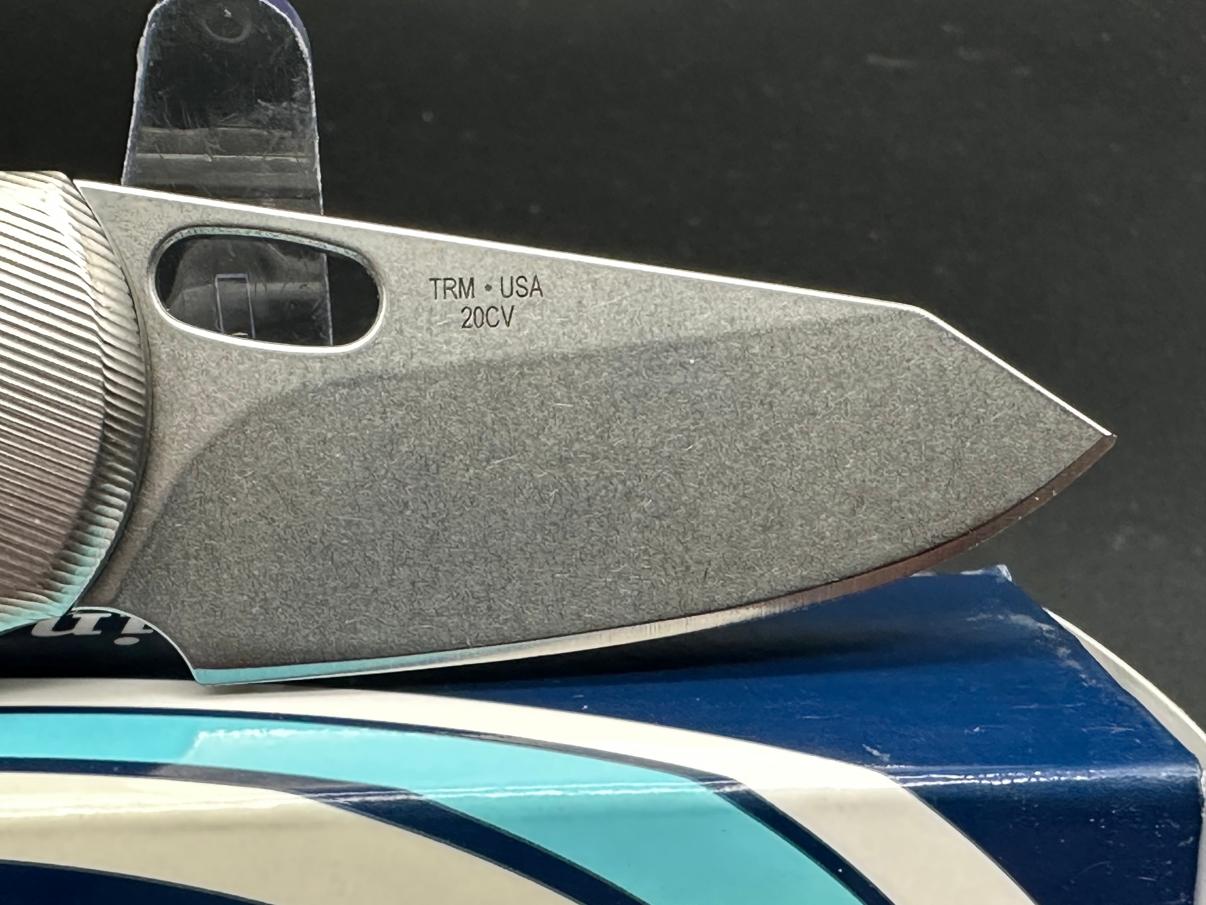 TRM Hole-Y Nerd Titanium handle w/20CV blade