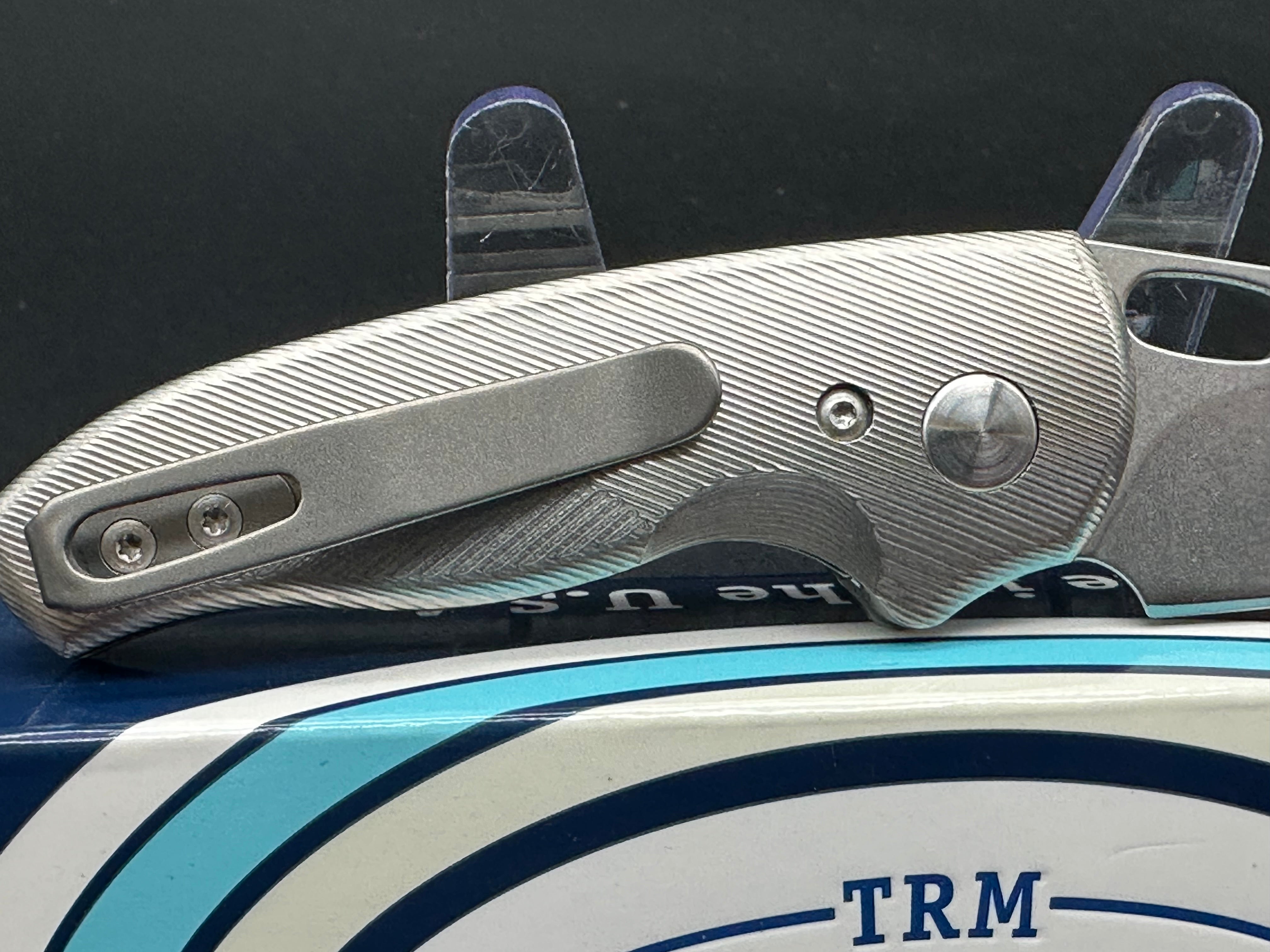 TRM Hole-Y Nerd Titanium handle w/20CV blade