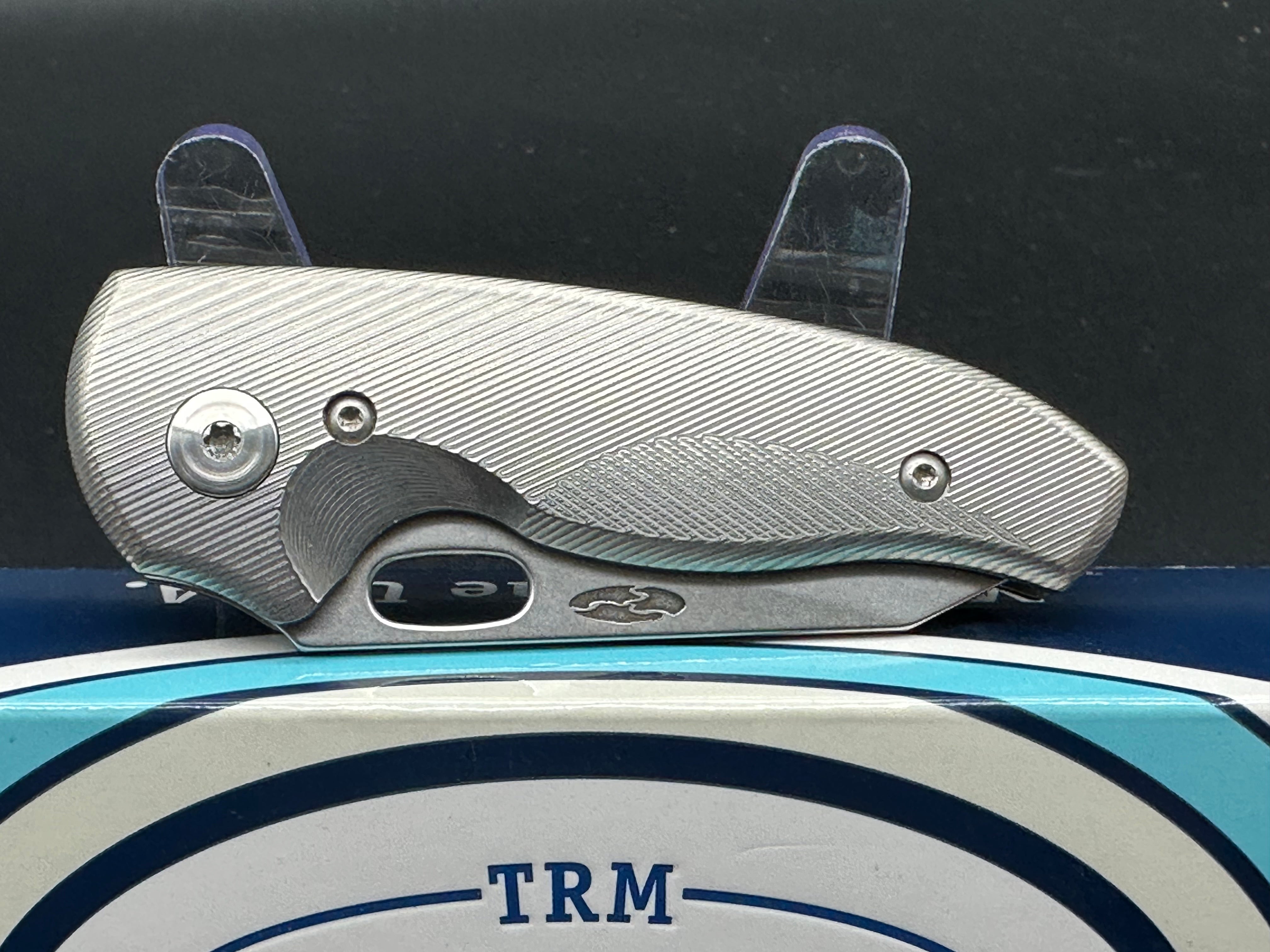 TRM Hole-Y Nerd Titanium handle w/20CV blade