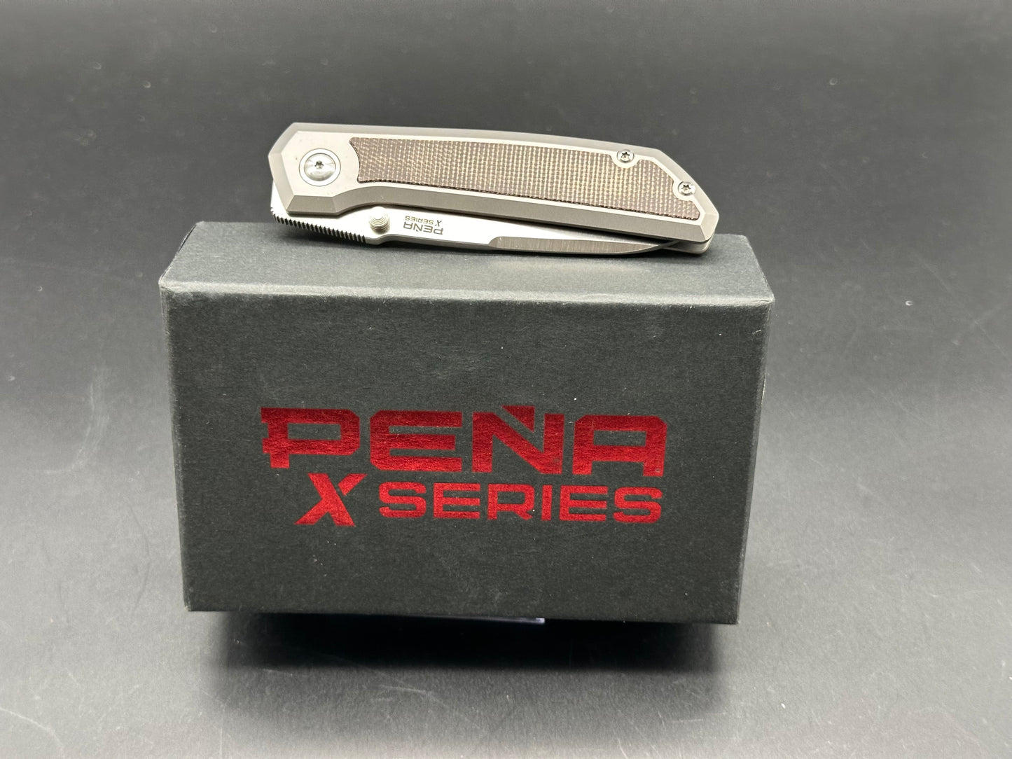 Pena X Series Mula M390 Titanium with Green Canvas Micarta Inlays