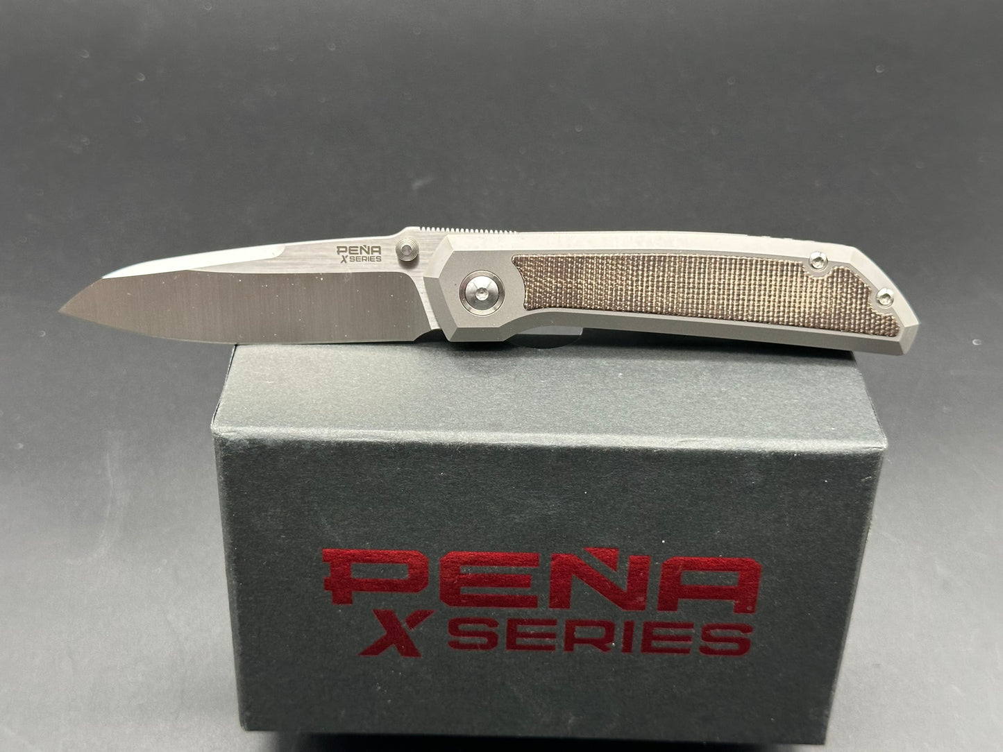 Pena X Series Mula M390 Titanium with Green Canvas Micarta Inlays