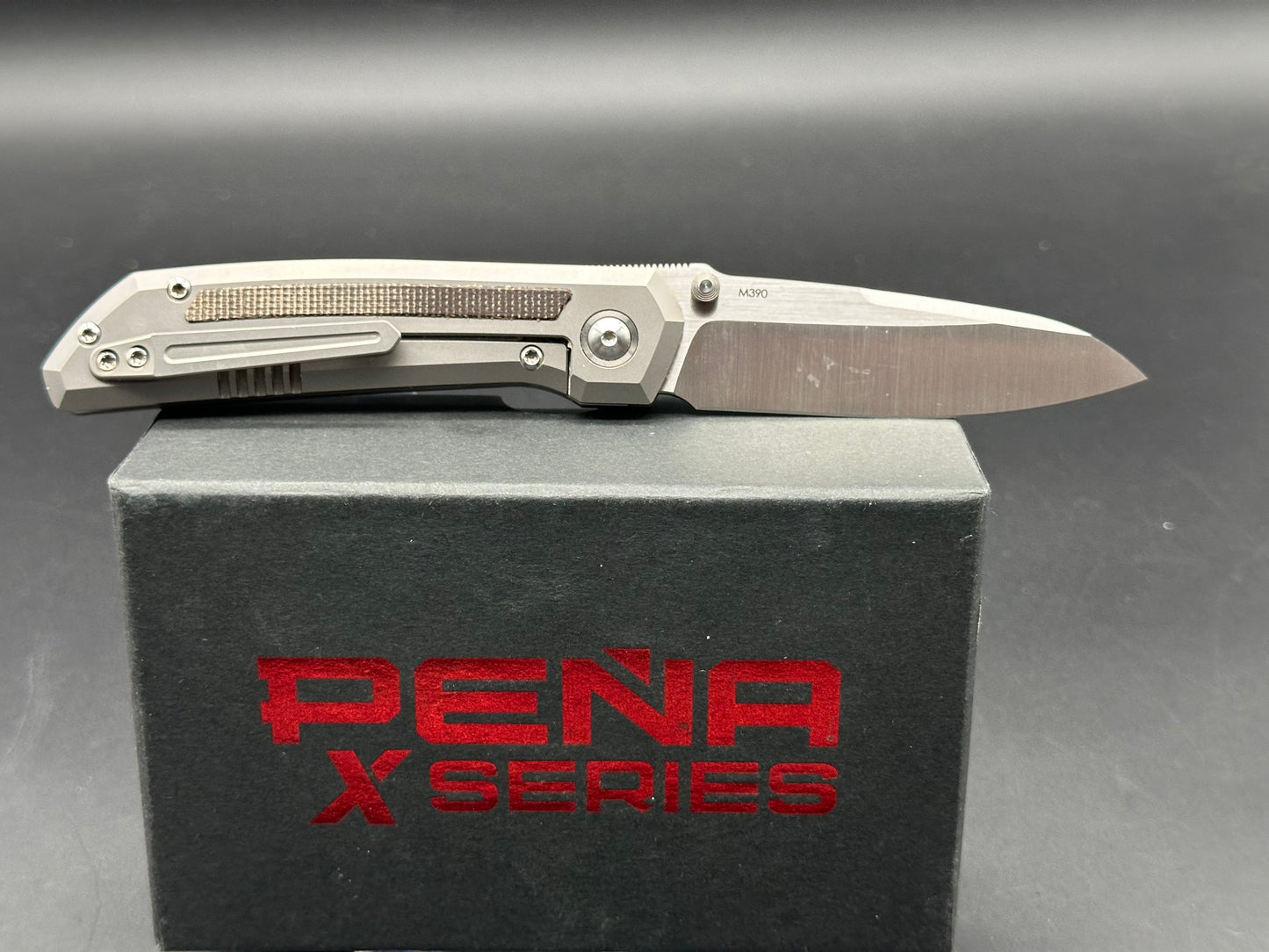 Pena X Series Mula M390 Titanium with Green Canvas Micarta Inlays