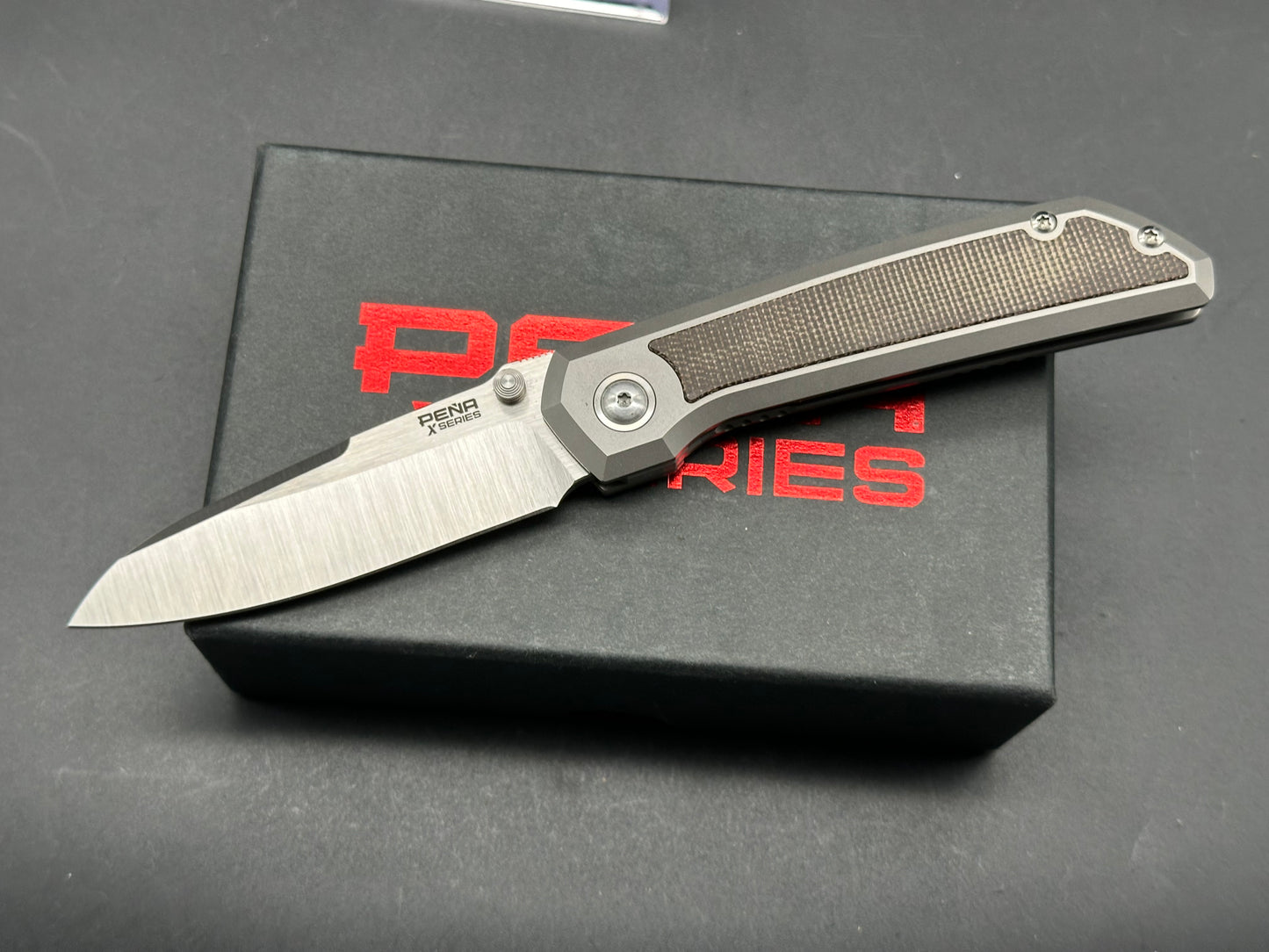 Pena X Series Mula M390 Titanium with Green Canvas Micarta Inlays