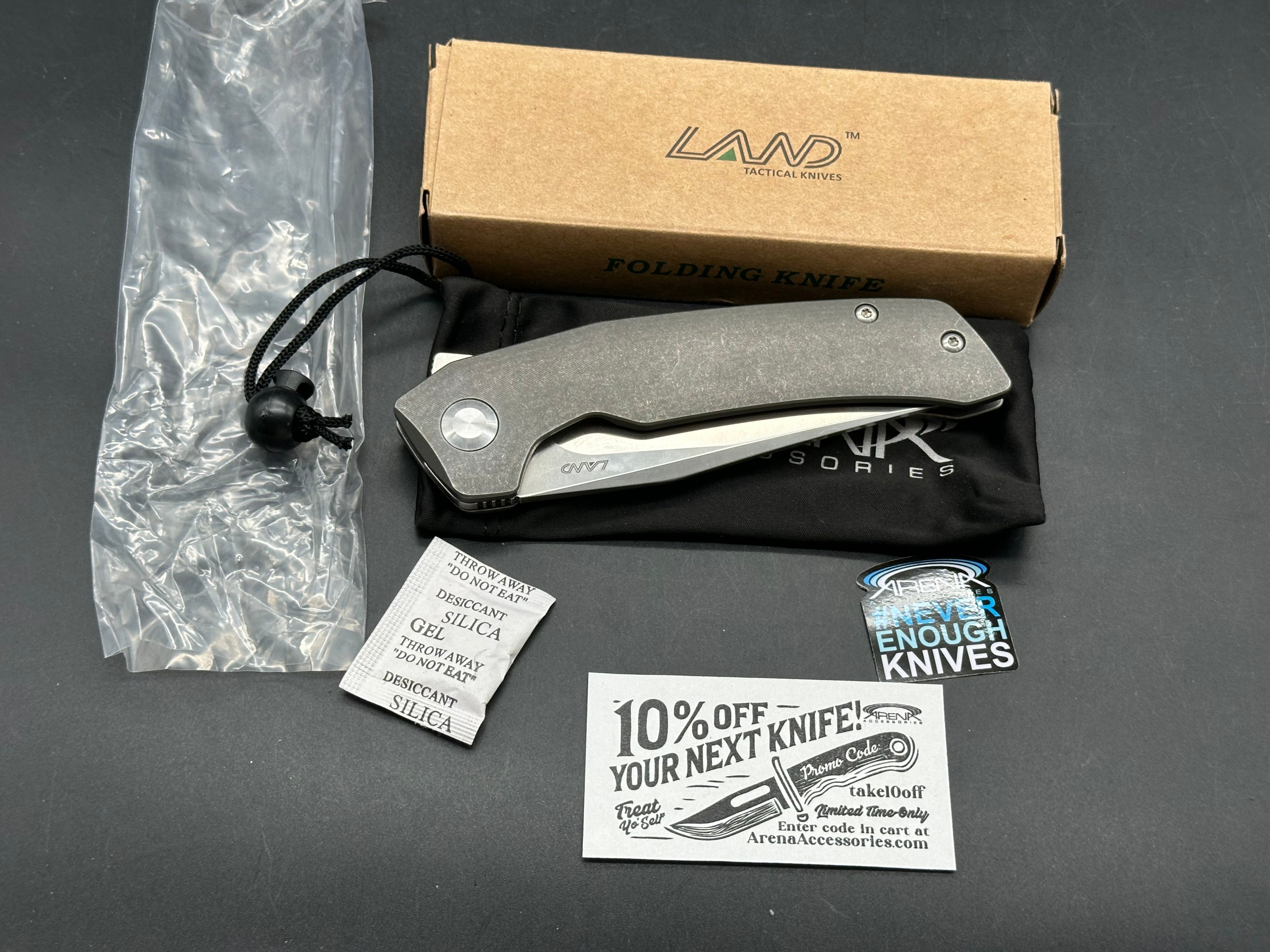 Land 140 titanium frame lock flipper w/VG10 blade