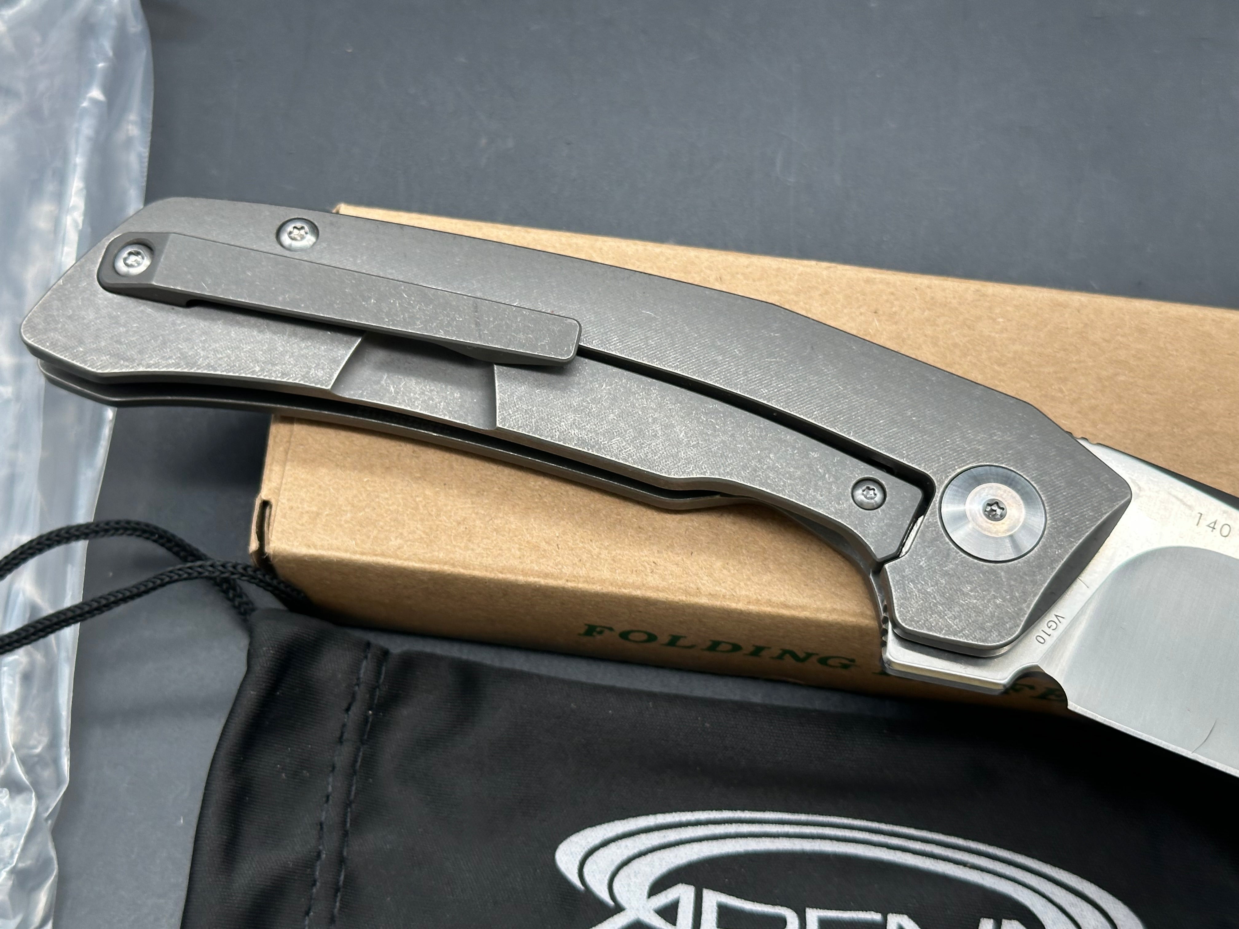 Land 140 titanium frame lock flipper w/VG10 blade