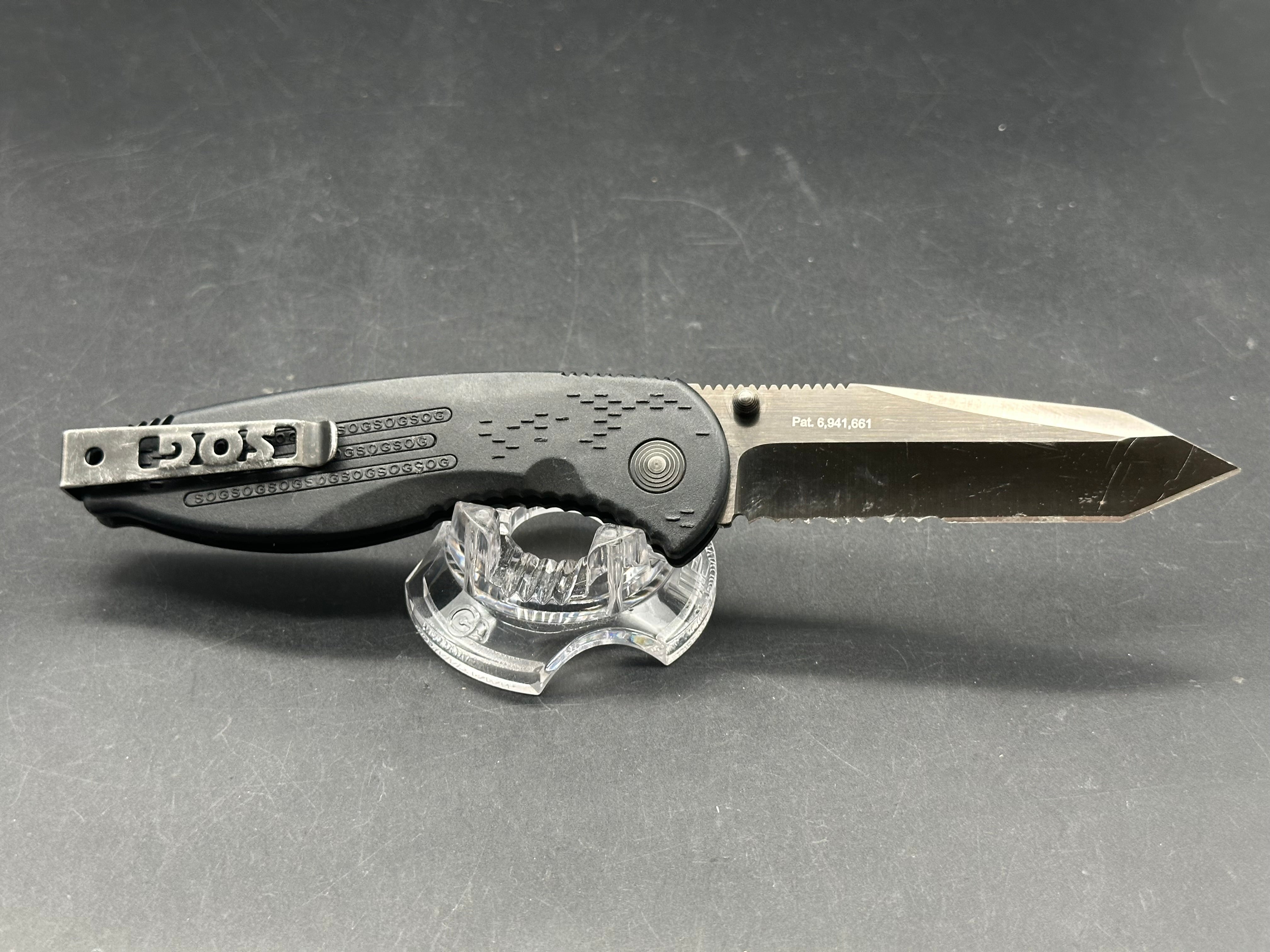 SOG Aegis Folding Knife Assisted 3.5" Black TiNi Combo Tanto Blade, Black GRN Handles, Arc-Lock