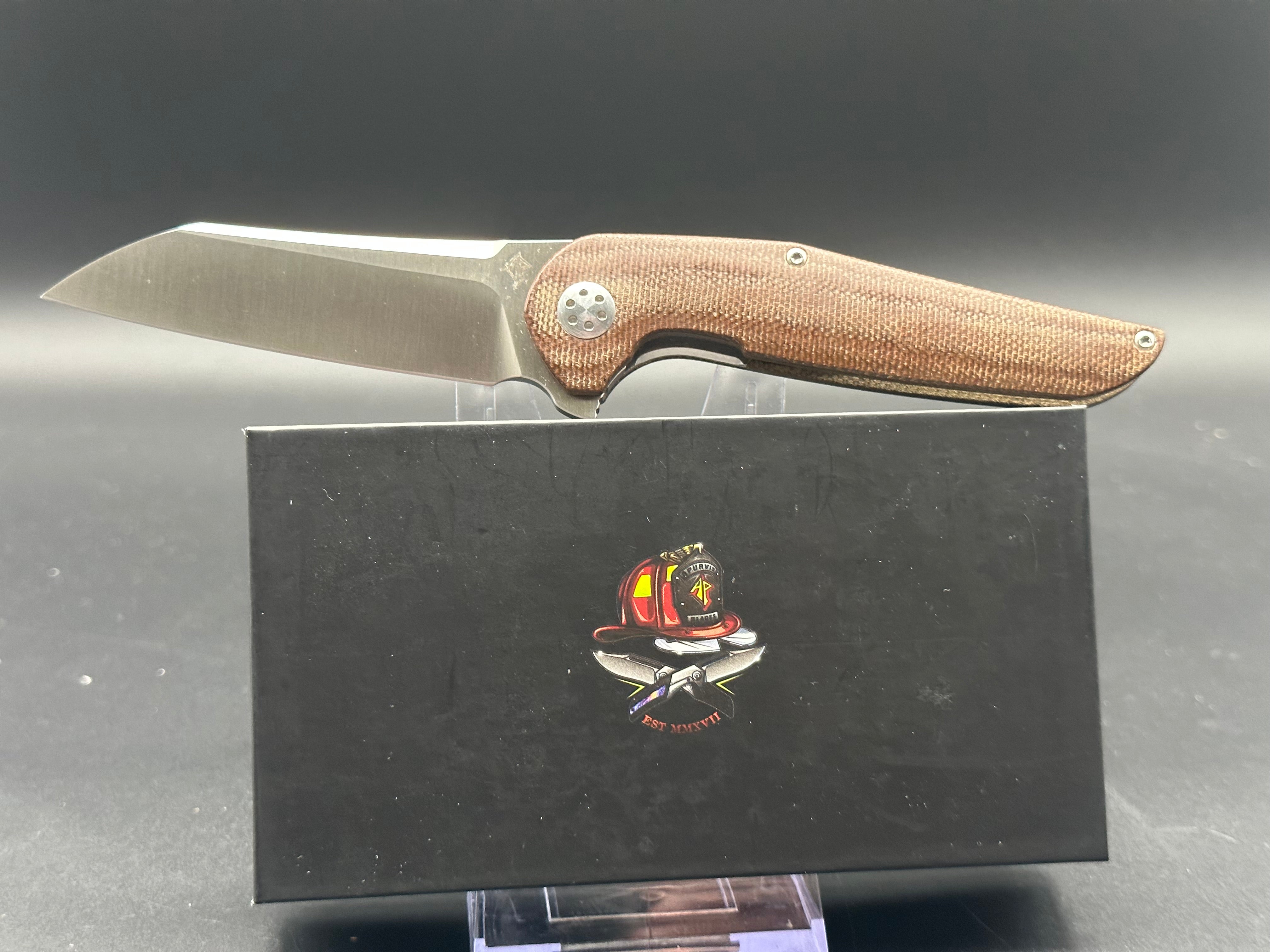 A Purvis Progeny MR micarta & 154CM blade