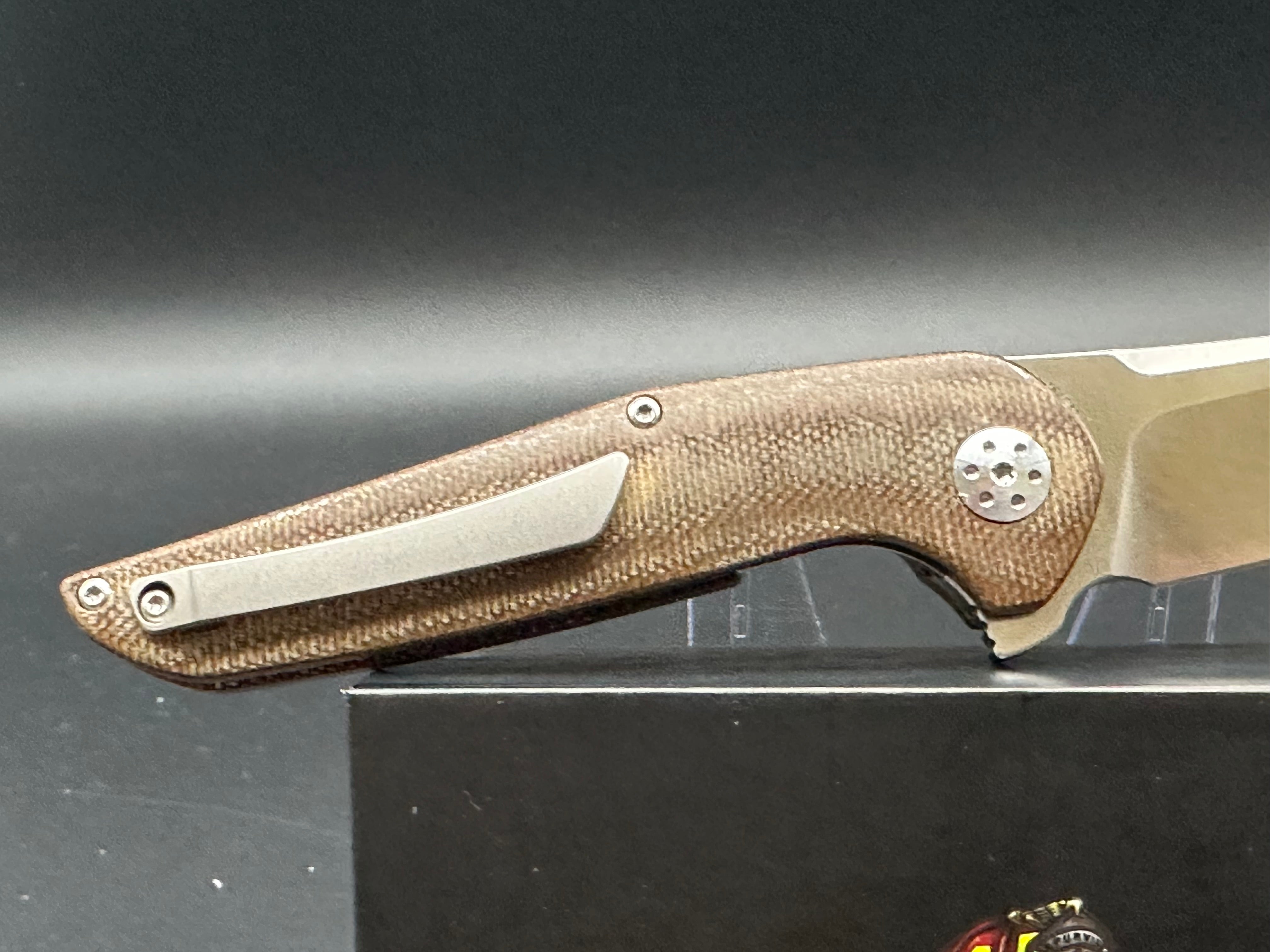 A Purvis Progeny MR micarta & 154CM blade