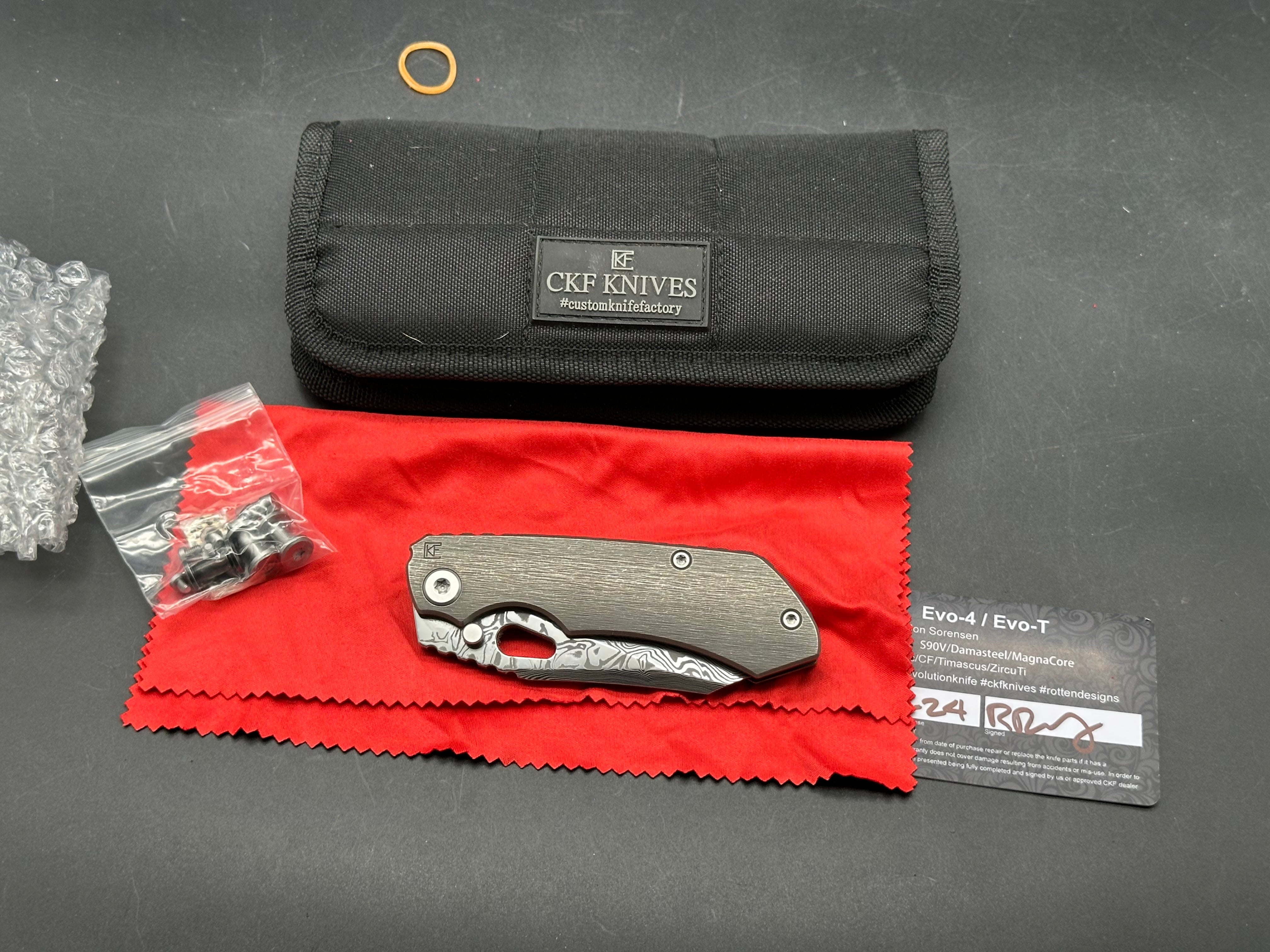 CKF Evo 4.0 damasteel and titanium