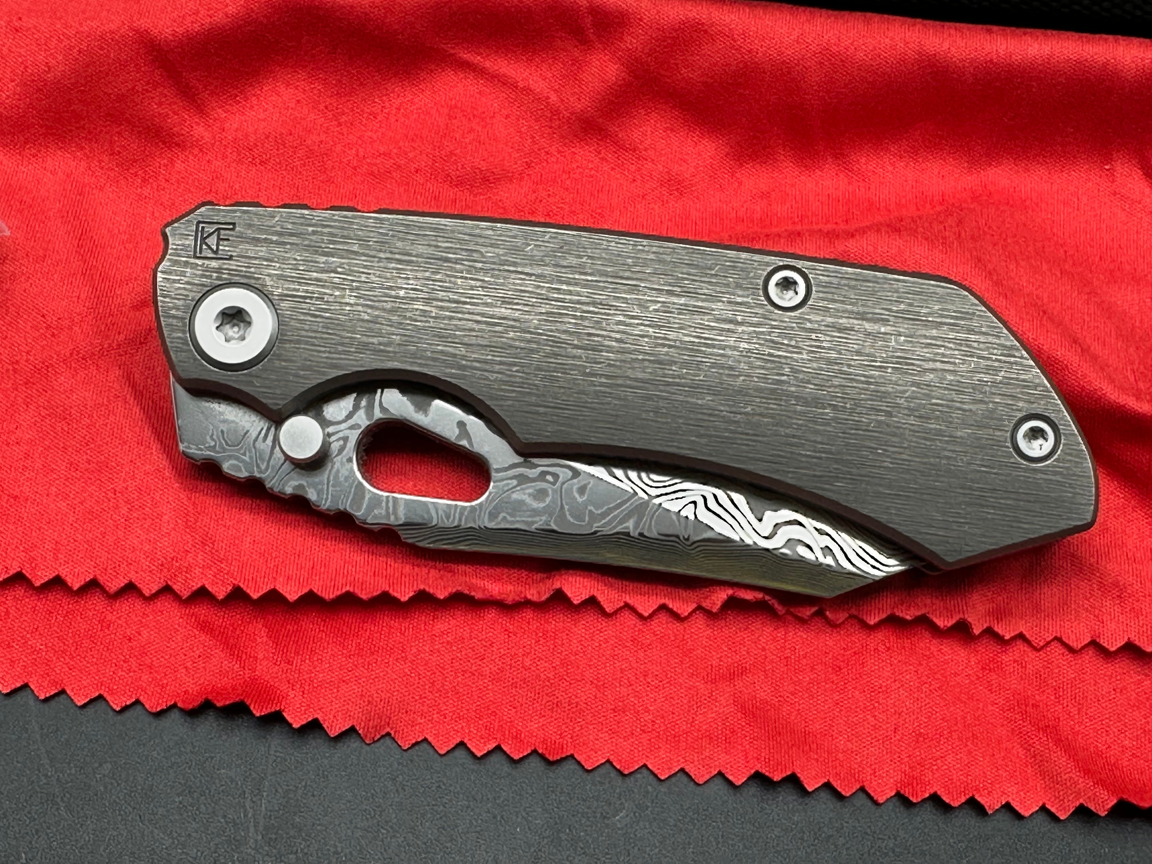 CKF Evo 4.0 damasteel and titanium