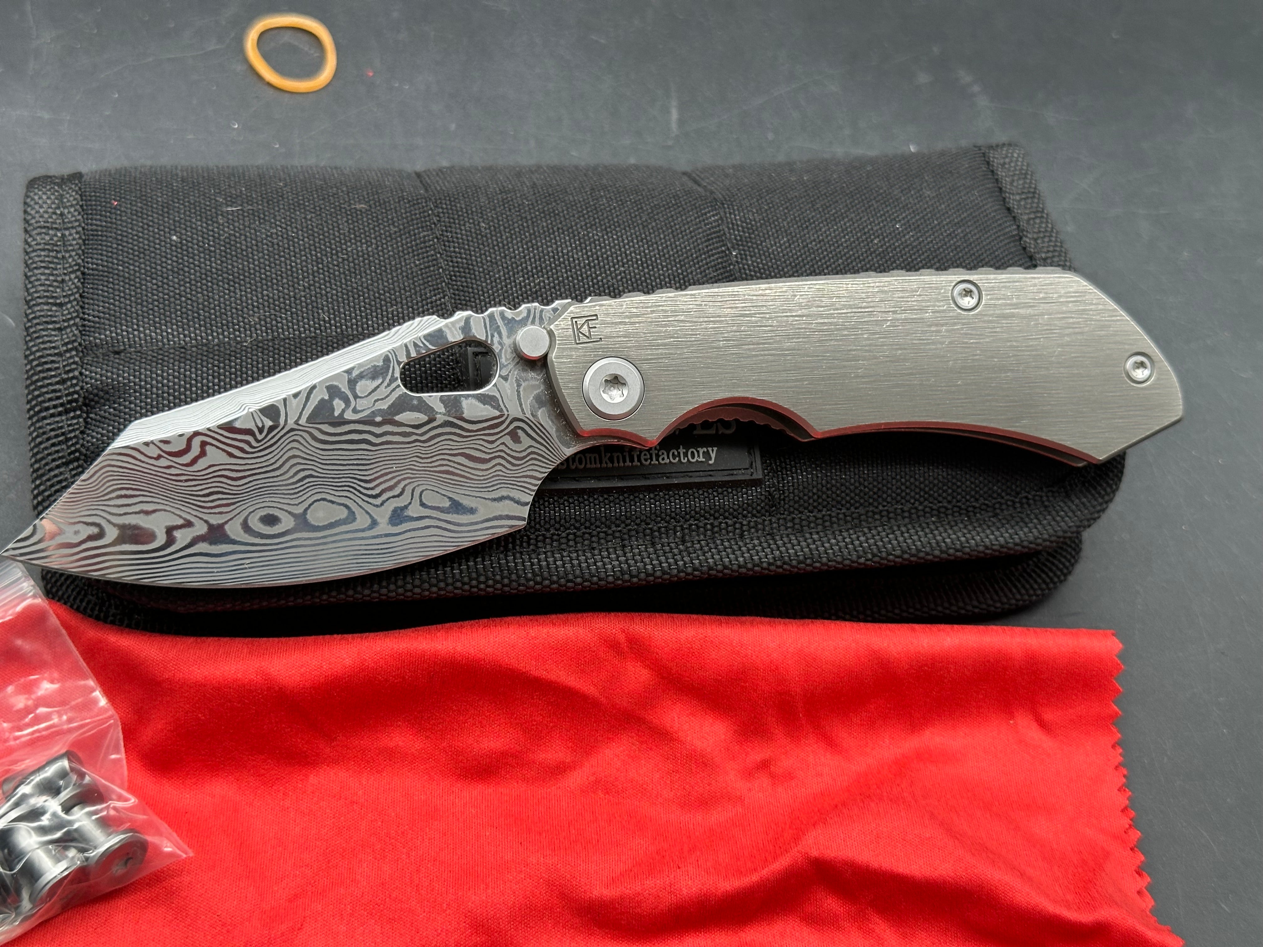 CKF Evo 4.0 damasteel and titanium