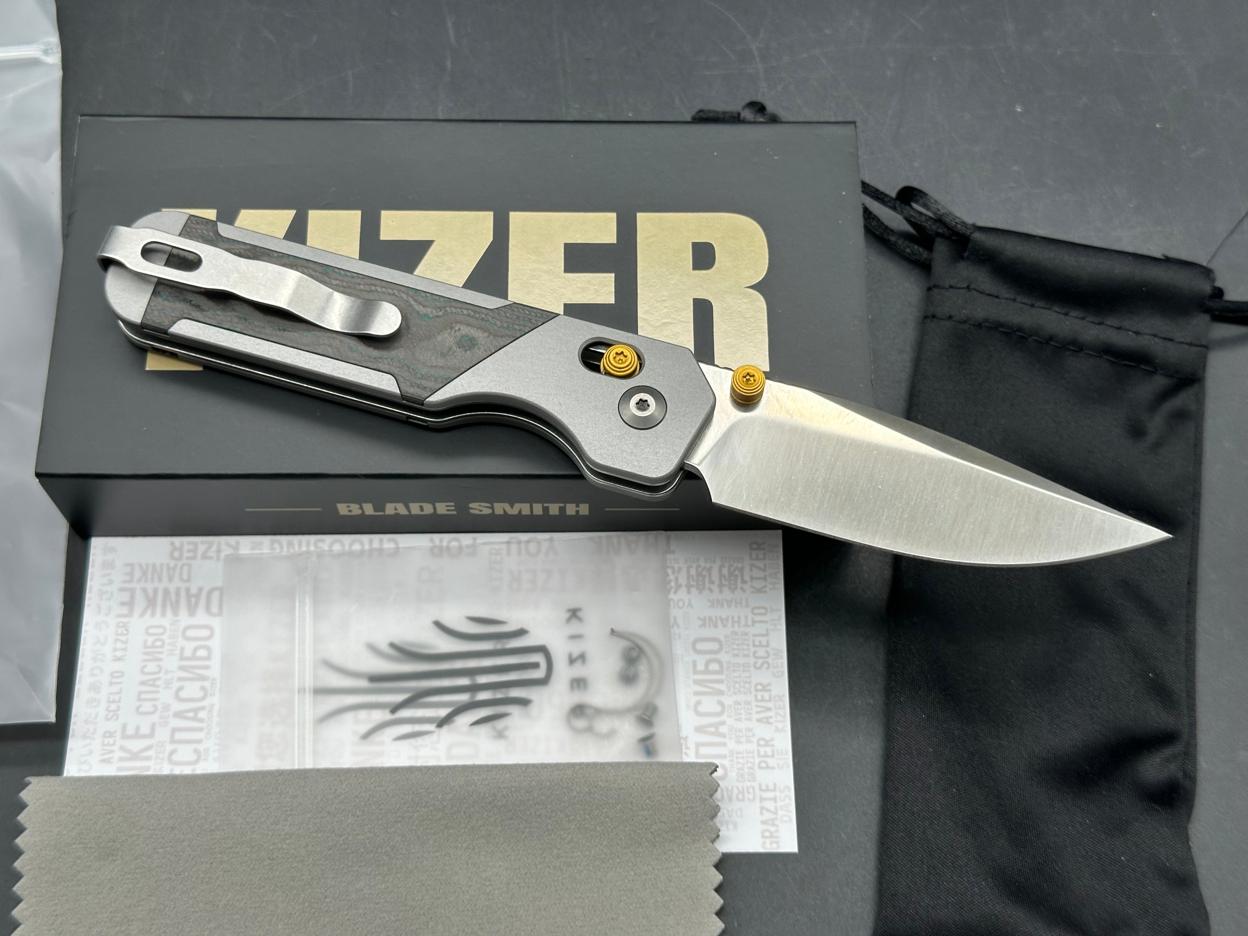 KIZER MILITAW 315 ALUMINUM/SHIPWRECK CAMOCARBON HANDLE ELMAX DROP POINT PLAIN EDGE