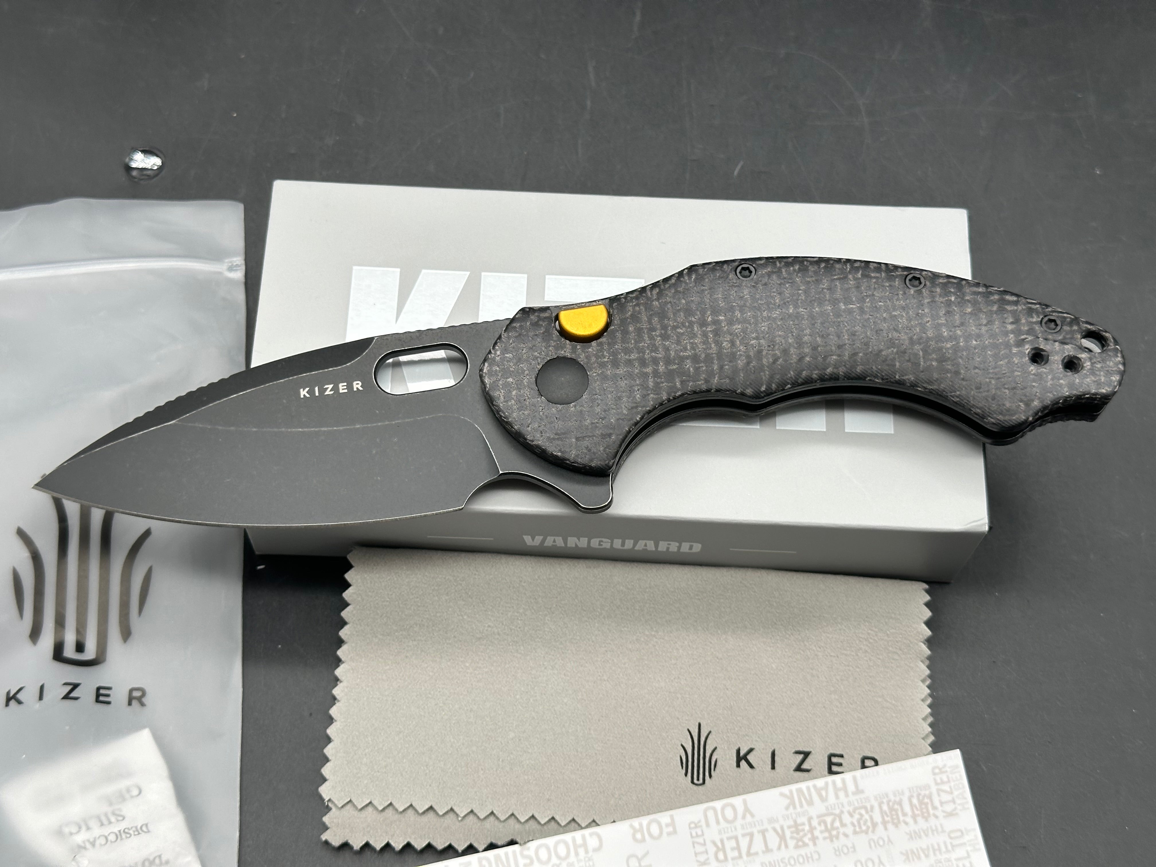 KIZER ROACH XL BLACK MICARTA HANDLE 14C28N DROP POINT PLAIN EDGE