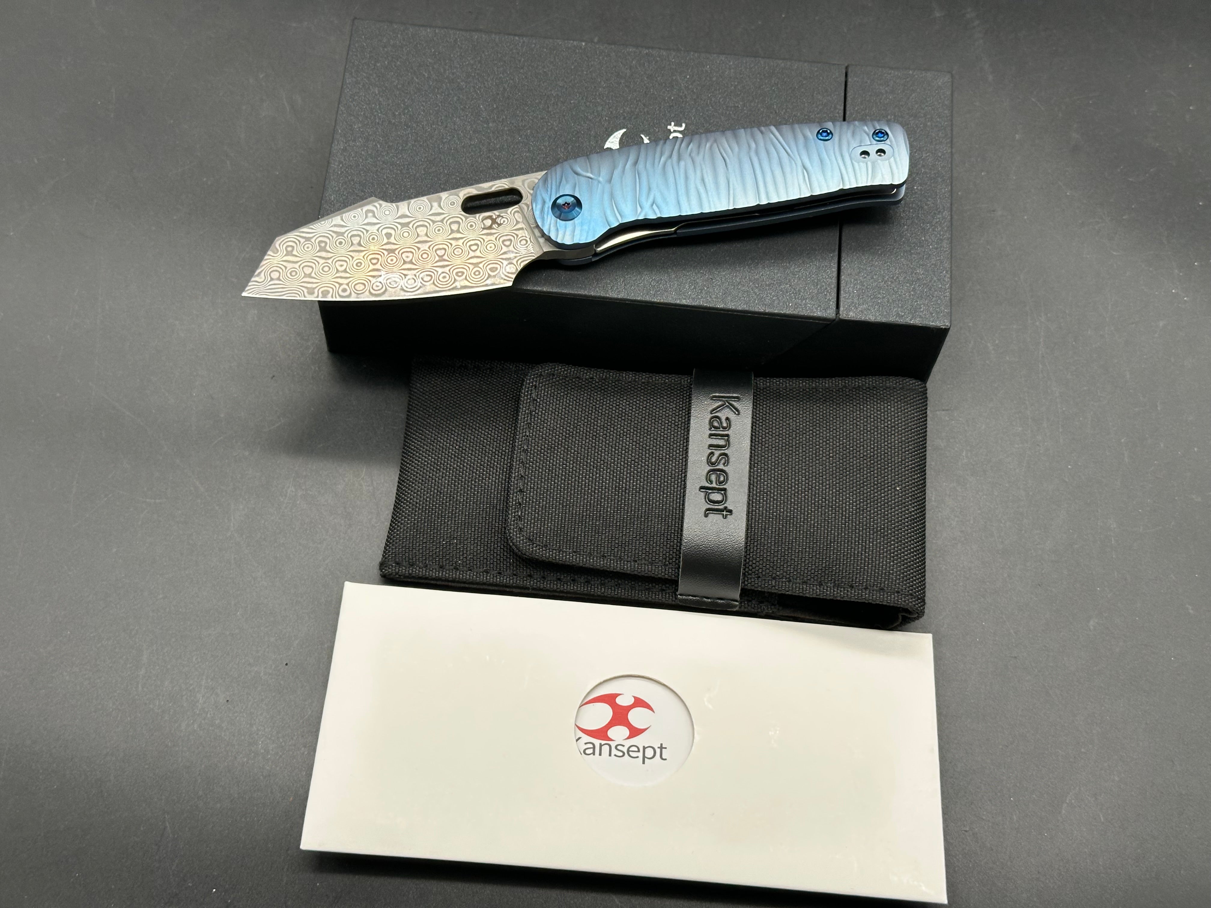 KANSEPT ORLOK FOLDING KNIFE BLUE TITANIUM HANDLE DAMASCUS PLAIN EDGE