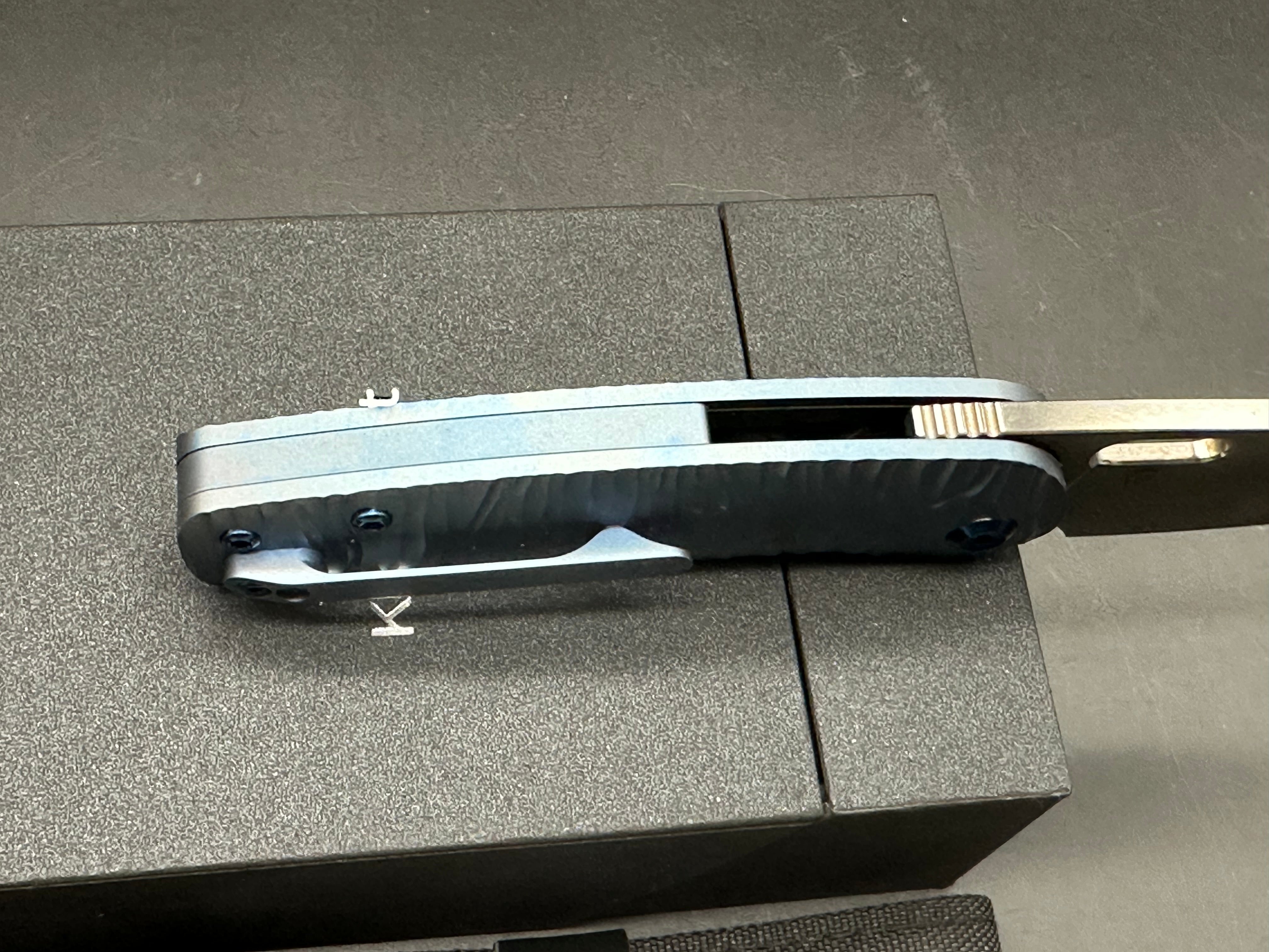 KANSEPT ORLOK FOLDING KNIFE BLUE TITANIUM HANDLE DAMASCUS PLAIN EDGE