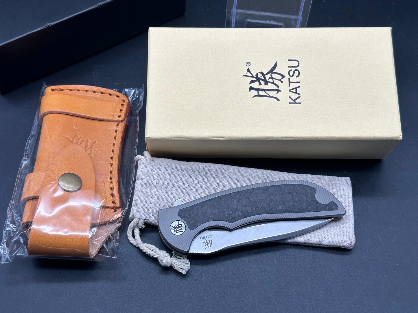 KATSU TK01, CPM S35VN Blade, Titanium & Carbon Fiber Handle, Leather Sheath