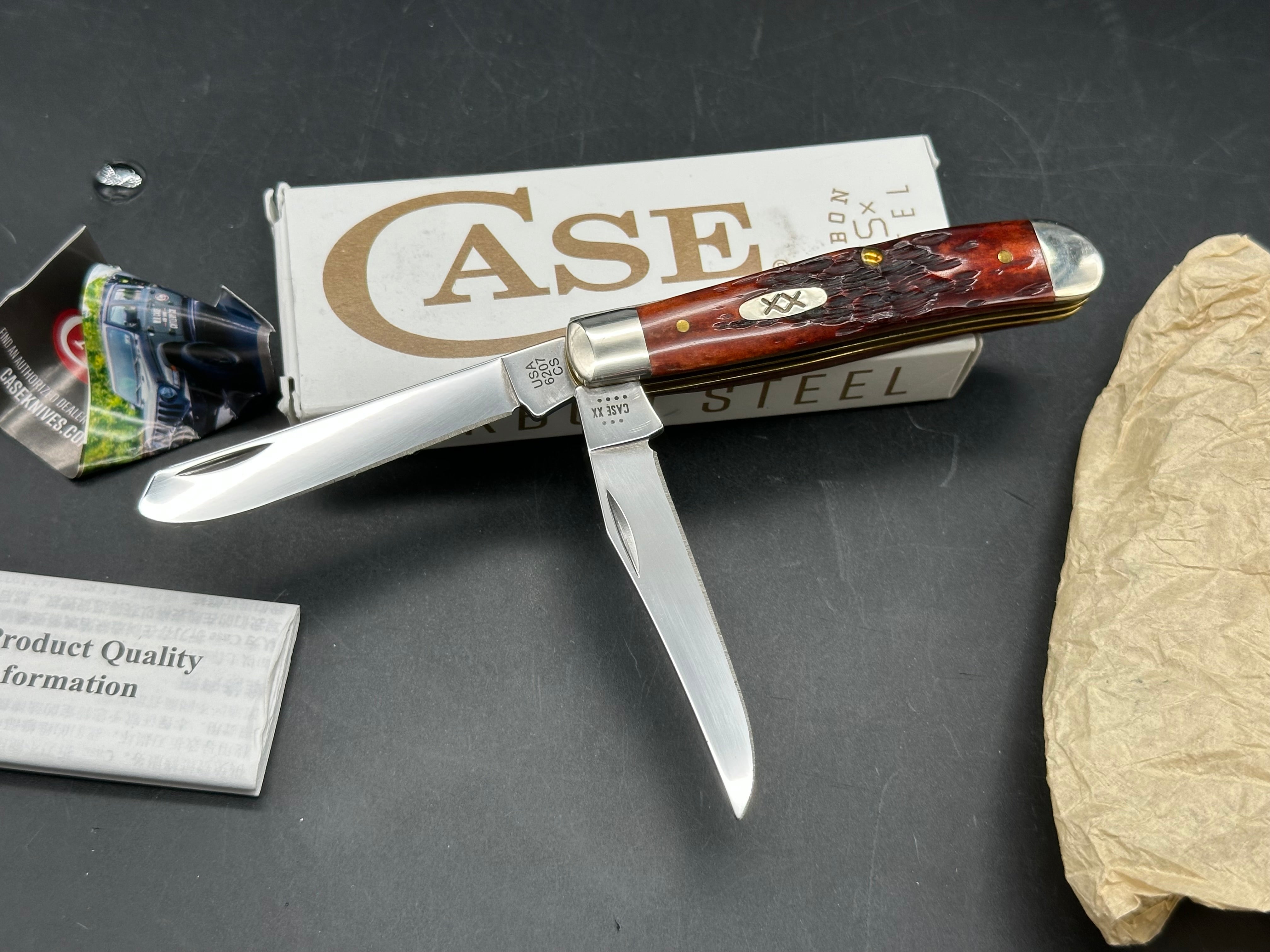 Case Mini Trapper mahogany bone peach seed milling on bone