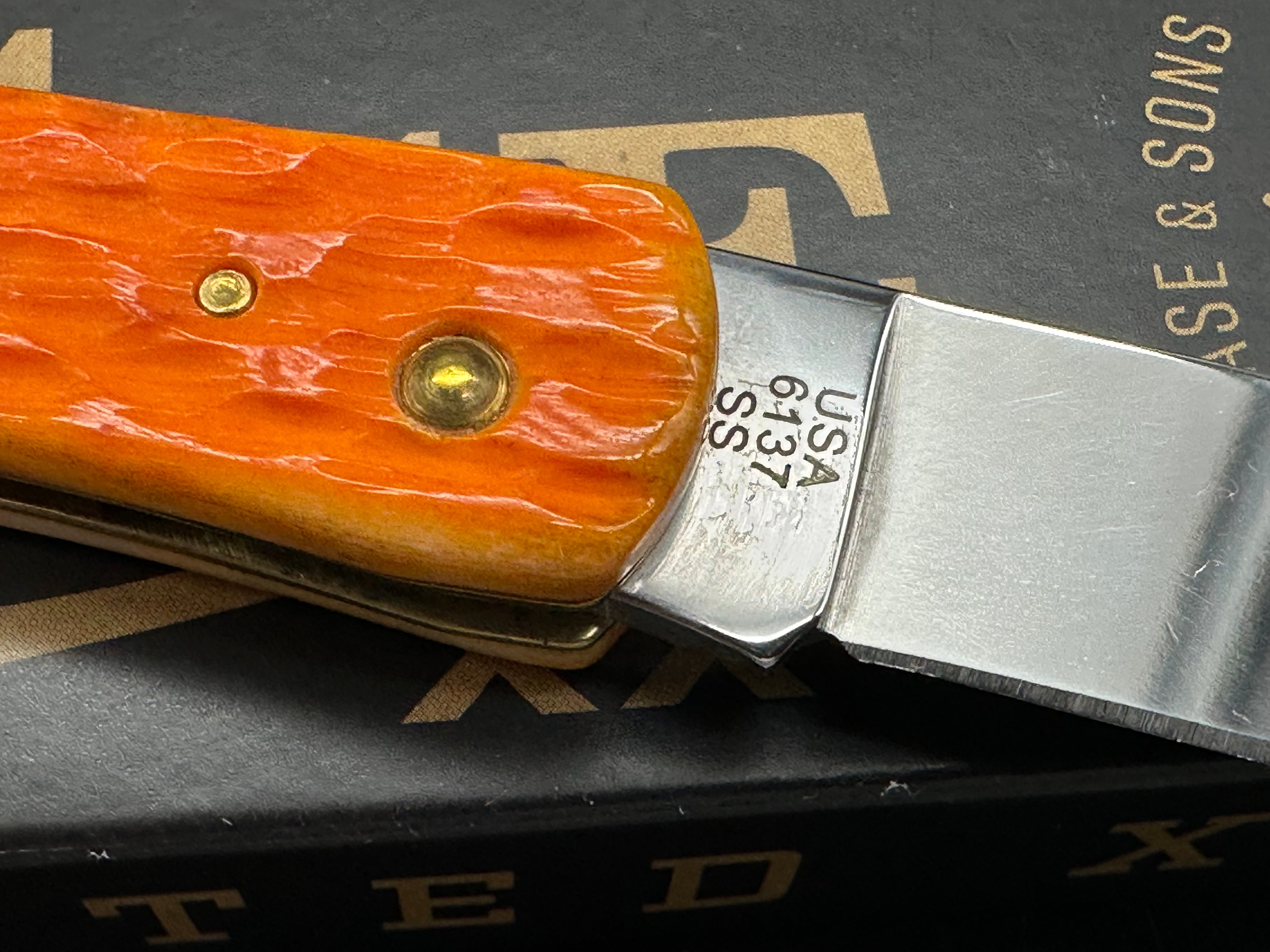 Case Sodbuster Jr persimmon orange bone stainless steel