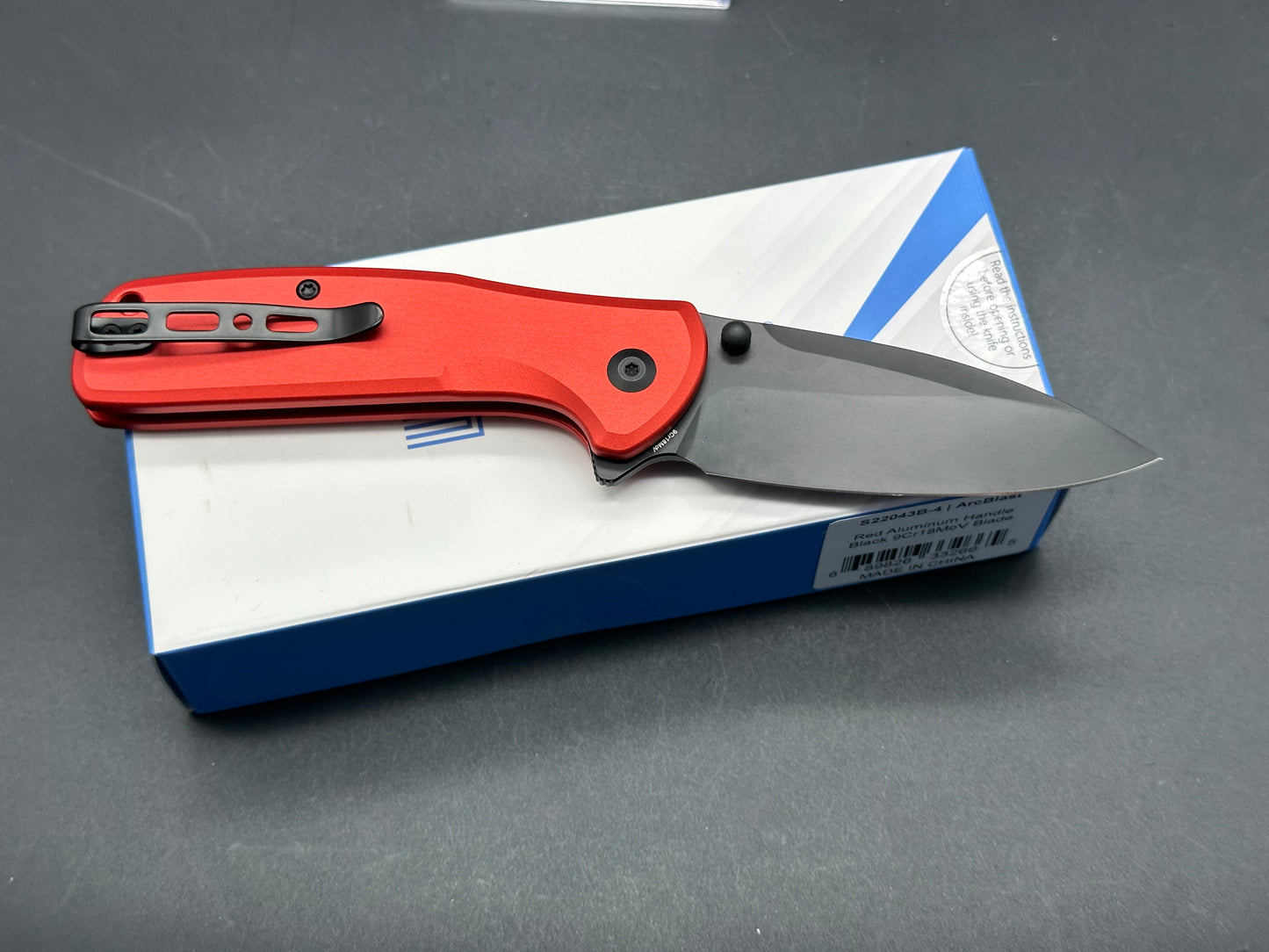 Sencut ArcBlast - Red Aluminum button lock flipper