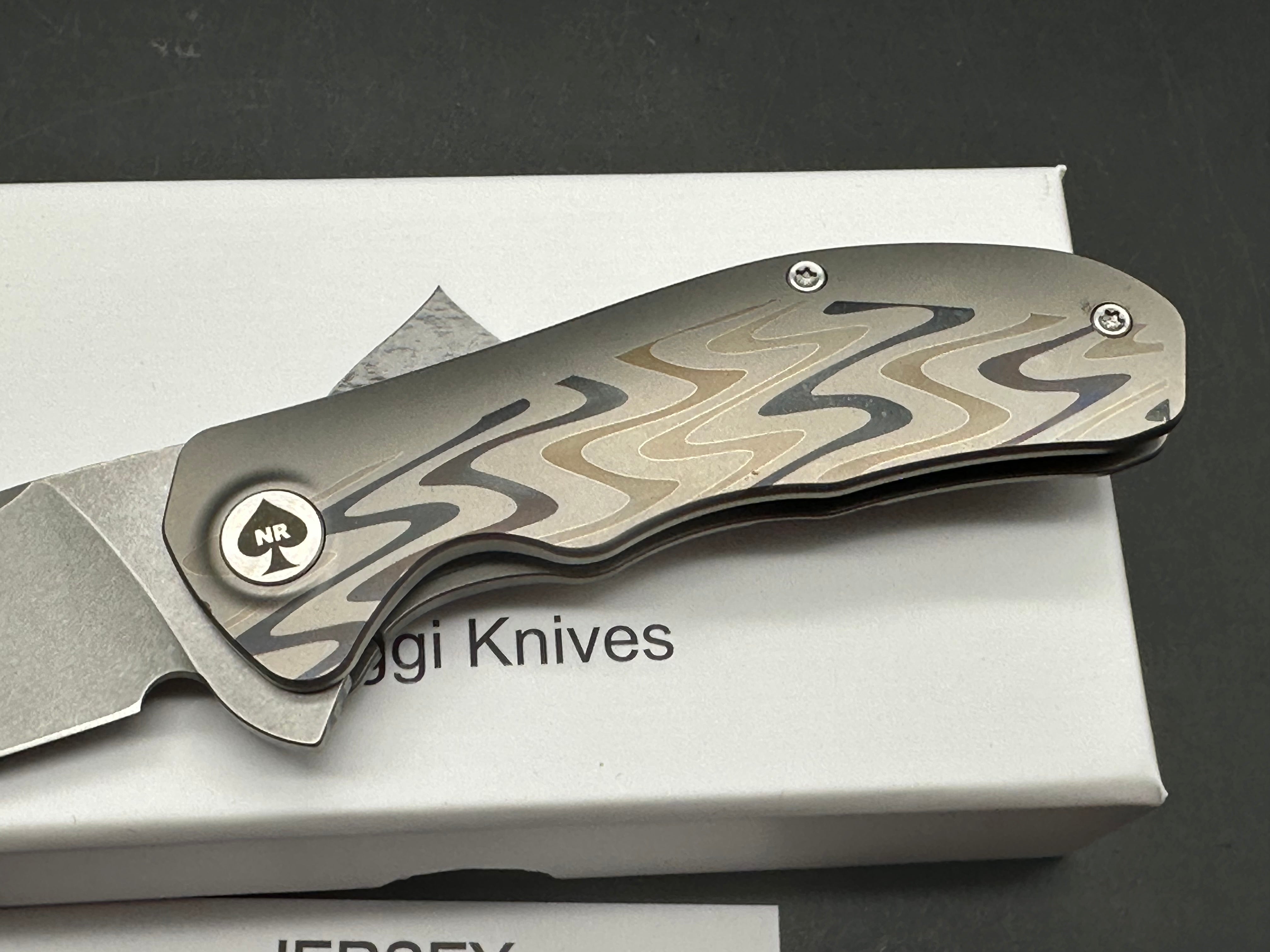 NRiggi Knives "JERSEY" Laser Engraved Titanium Scales w/CPM 20CV stonewash blade (wave pattern)