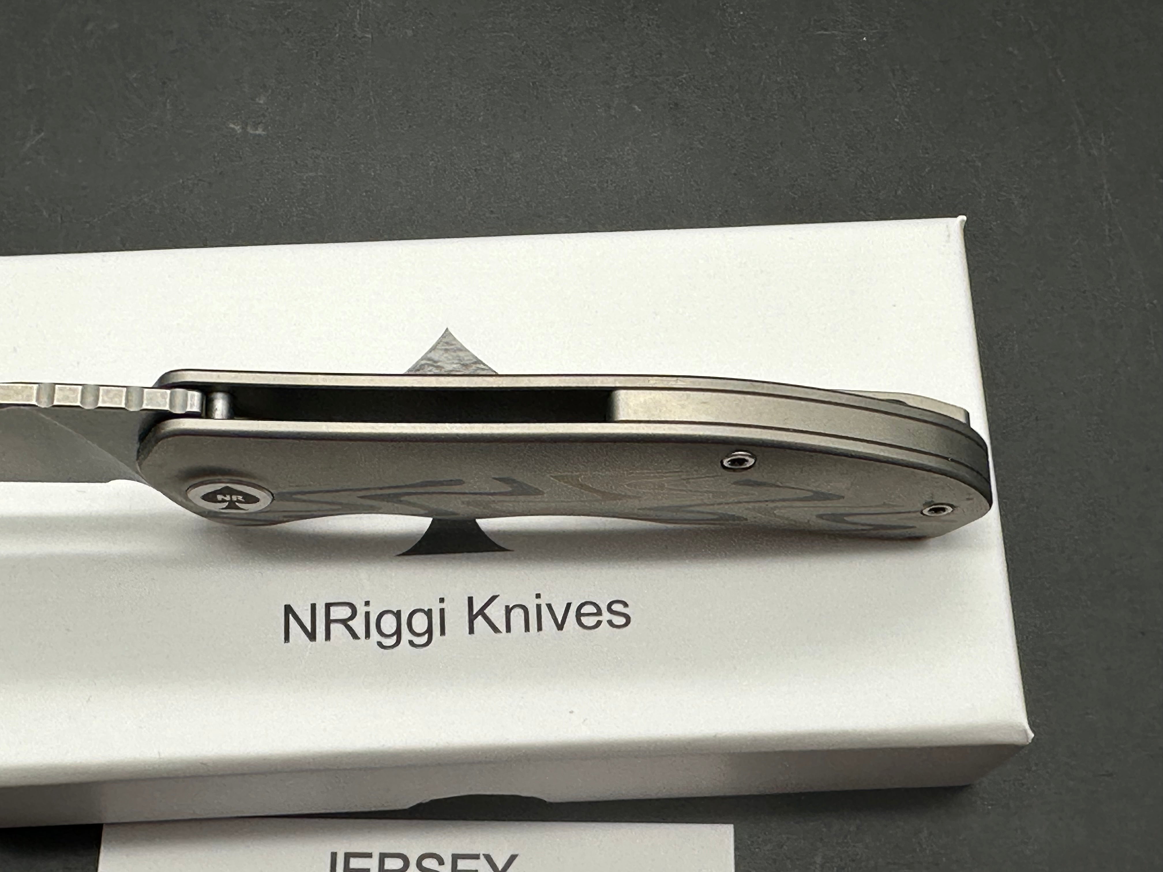 NRiggi Knives "JERSEY" Laser Engraved Titanium Scales w/CPM 20CV stonewash blade (wave pattern)