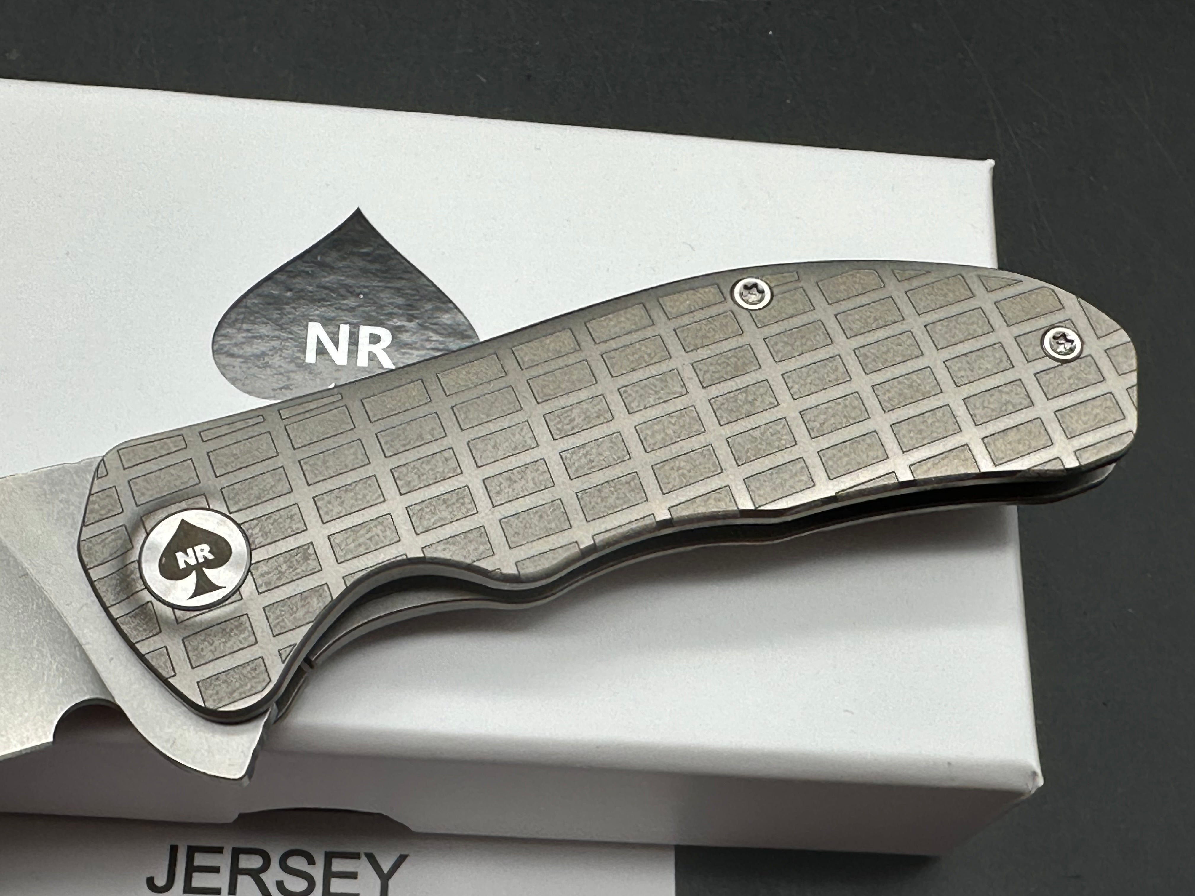 NRiggi Knives "JERSEY" Laser Engraved Titanium Scales w/CPM 20CV stonewash blade (brick pattern)