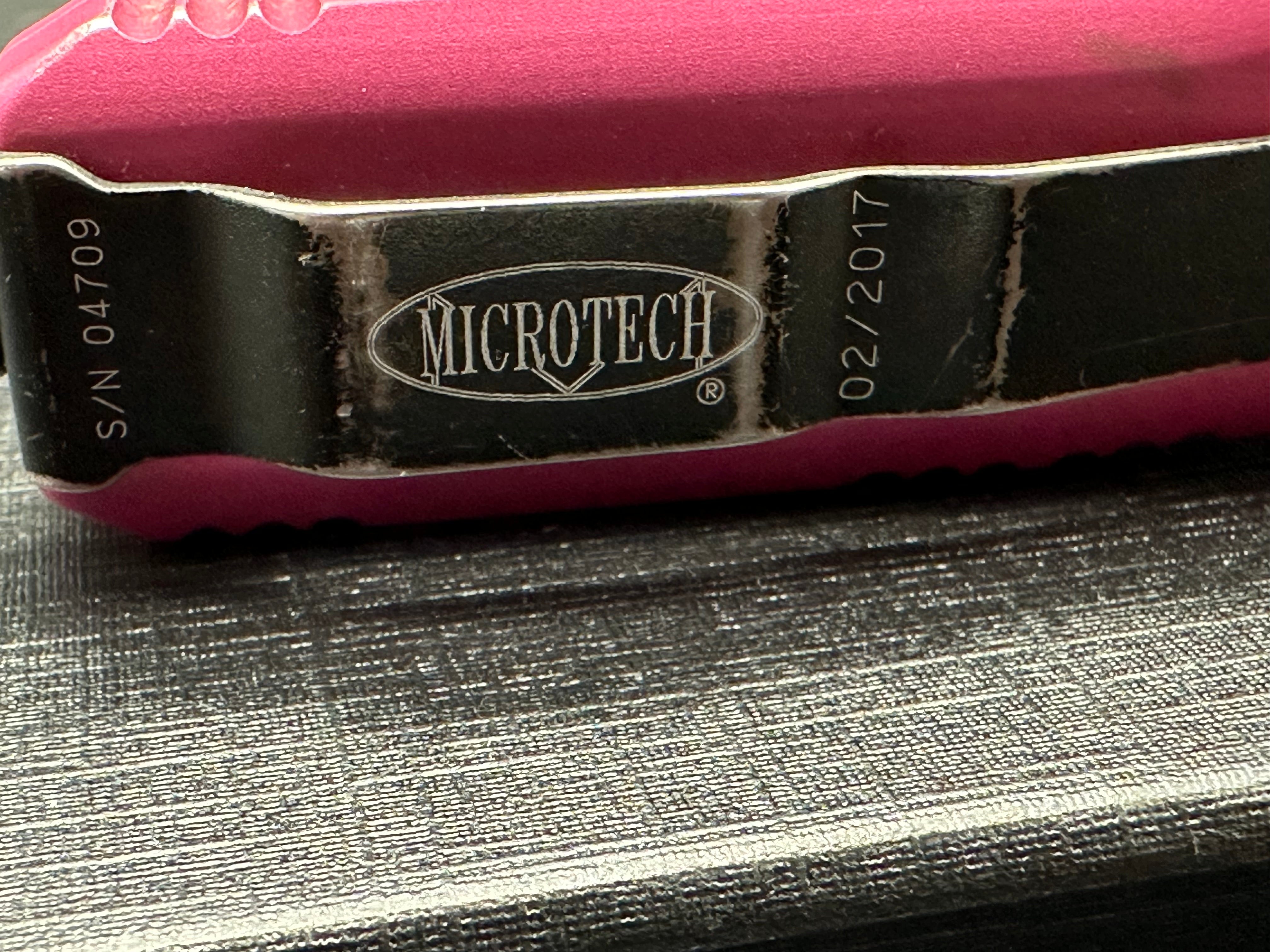 Microtech UTX 85 marks on aluminum scales