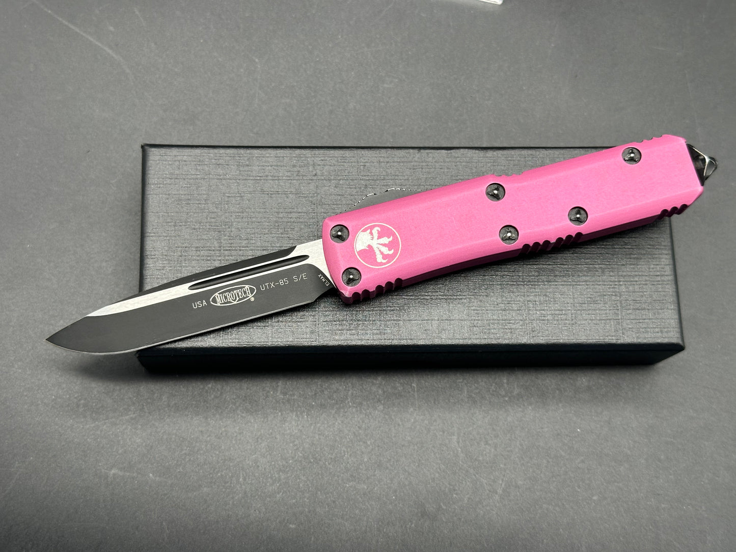 Microtech UTX 85 marks on aluminum scales