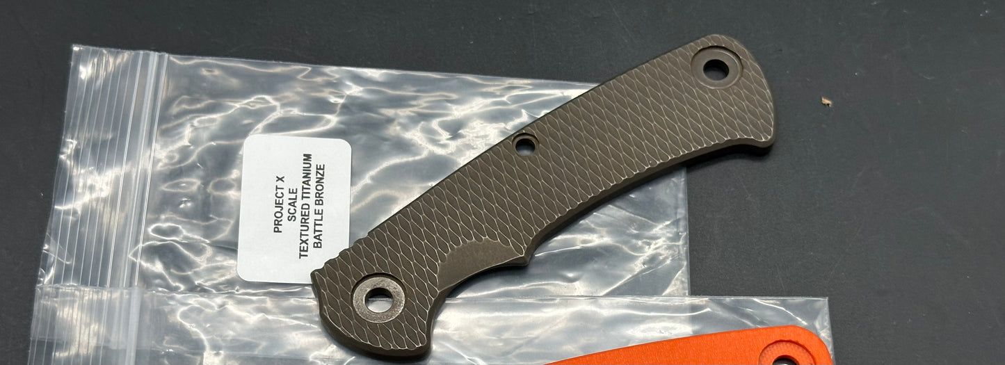 Hinderer Project X battle bronze titanium scale