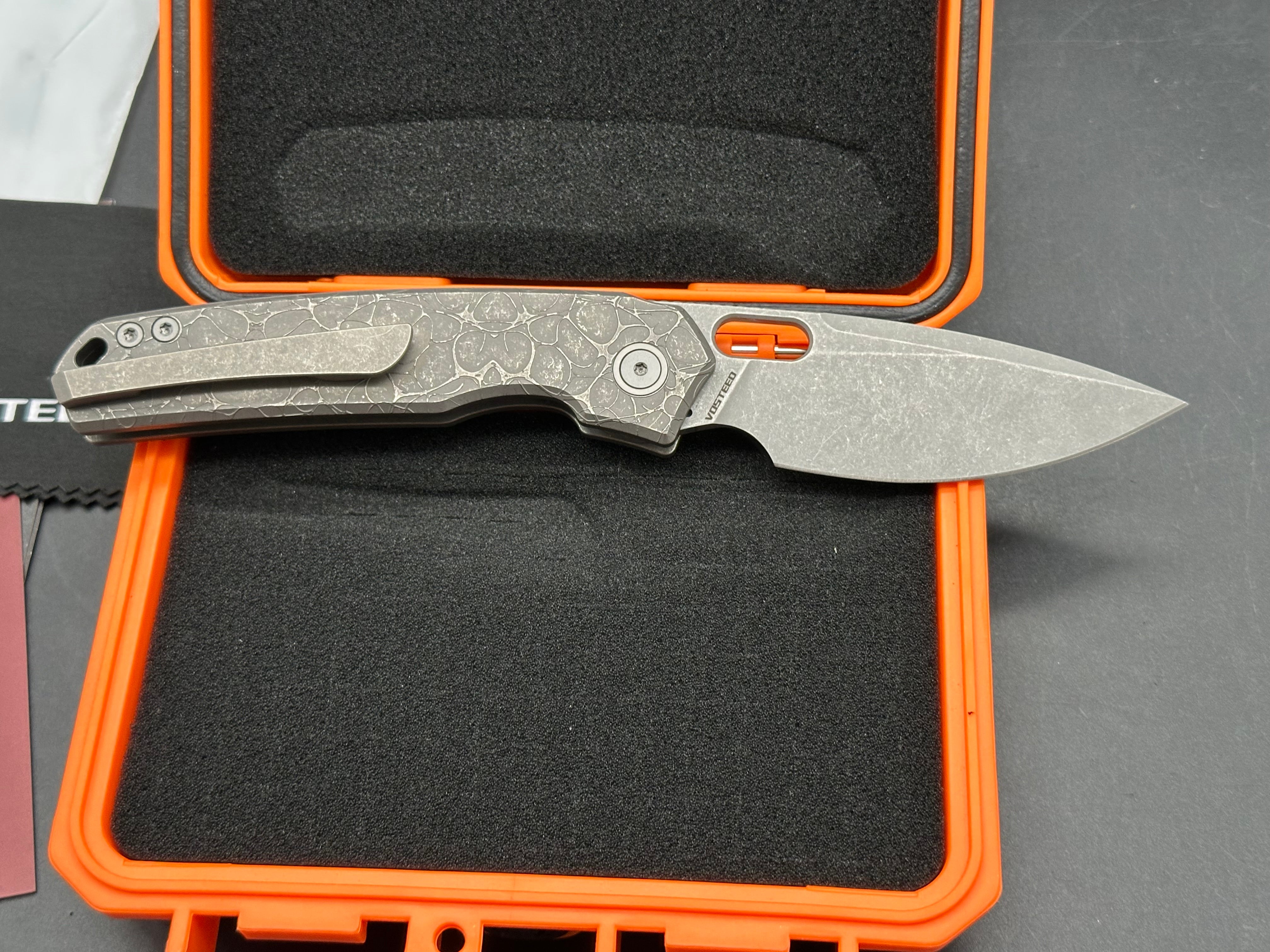 Vosteed Psyop (A2222), Acid Wash/Stonewashed Elmax Blade, Dark Blasted and Tumbled Titanium Handles